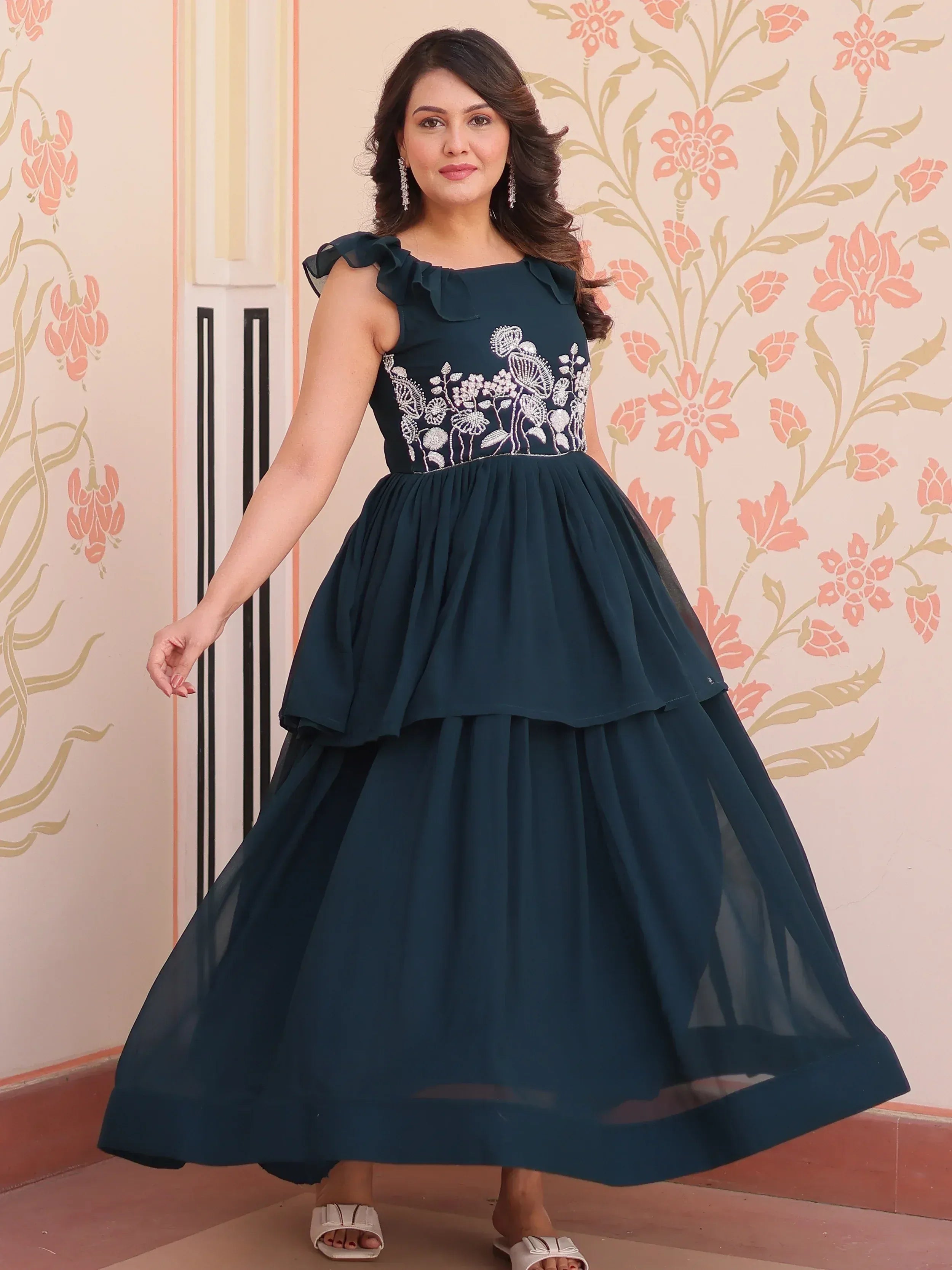 Elegant teal ethnic gown with floral embroidery and ruffled sleeves for festive occasions