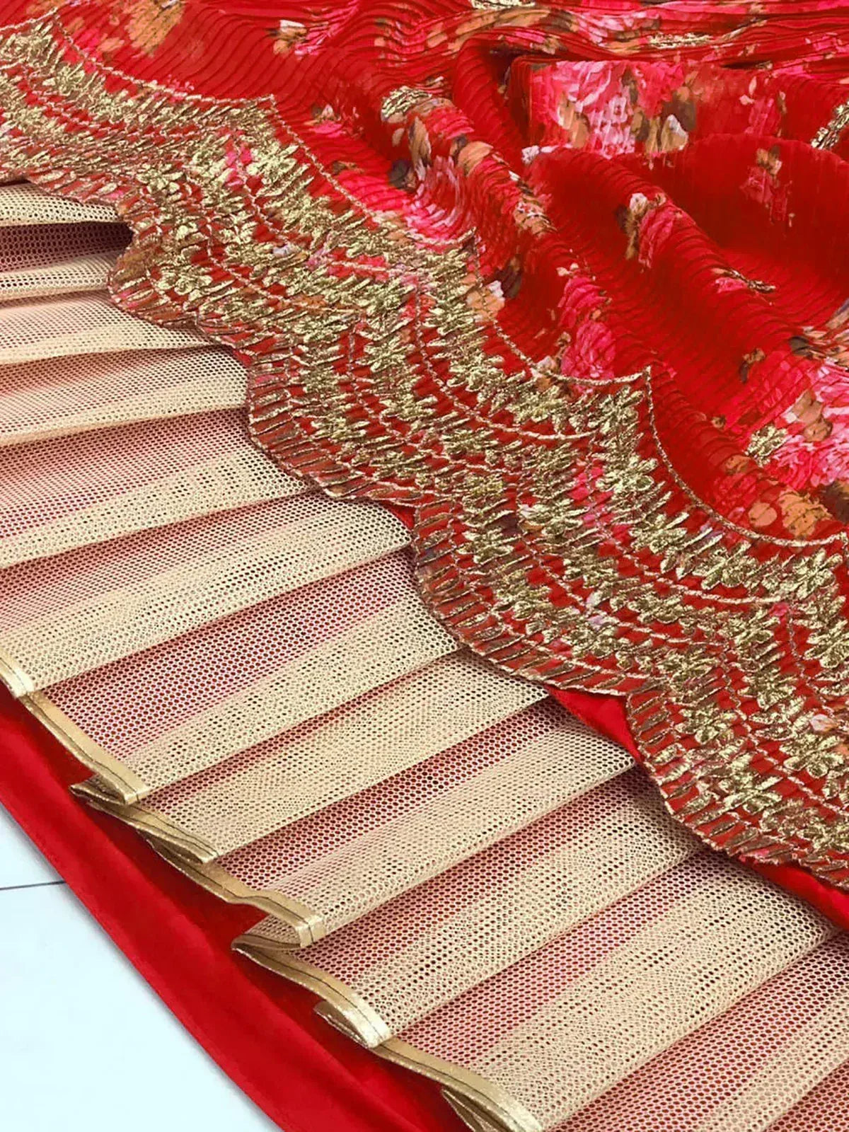Red designer lehenga with gold embroidery and net skirt, ethnic Indian wear