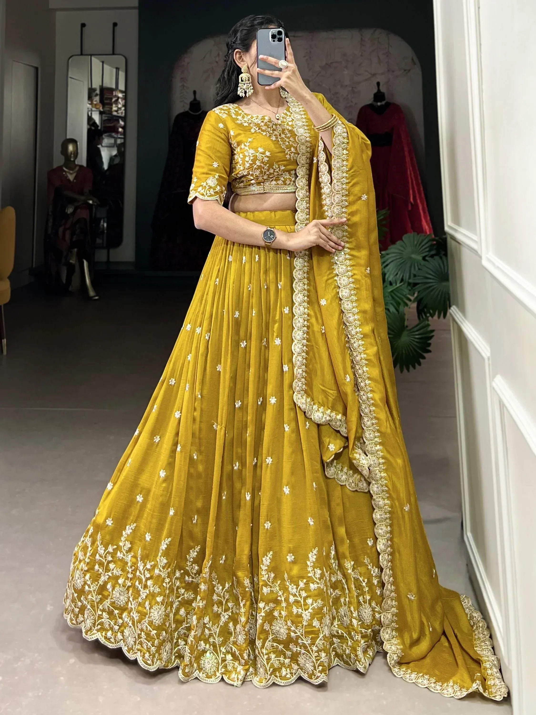 Mustard yellow lehenga choli with white floral embroidery, perfect for Indian ethnic wear occasions