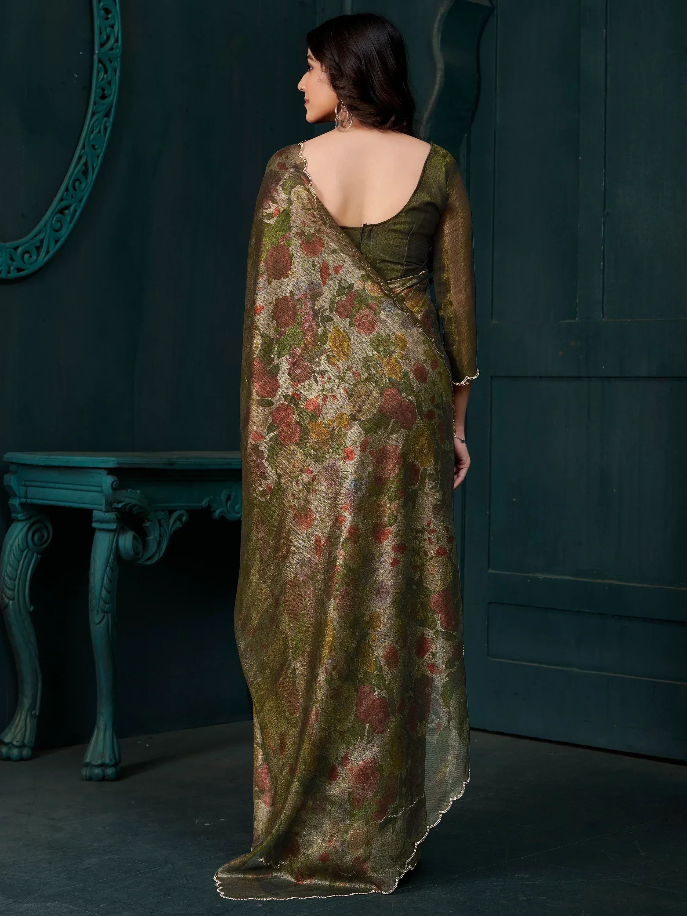 Elegant olive green floral saree with scalloped border, perfect for Indian ethnic occasions