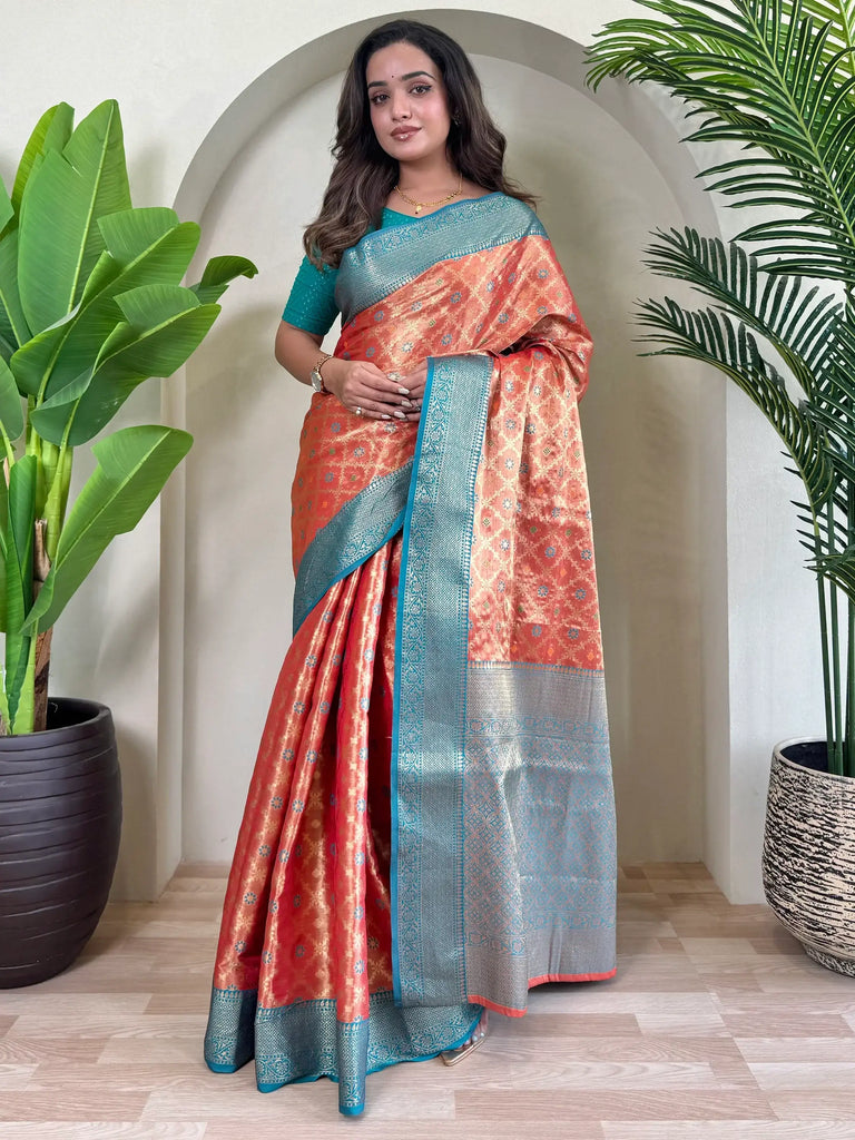 Charming Orange Zari Weaving Tissue Silk Festival Wear Saree