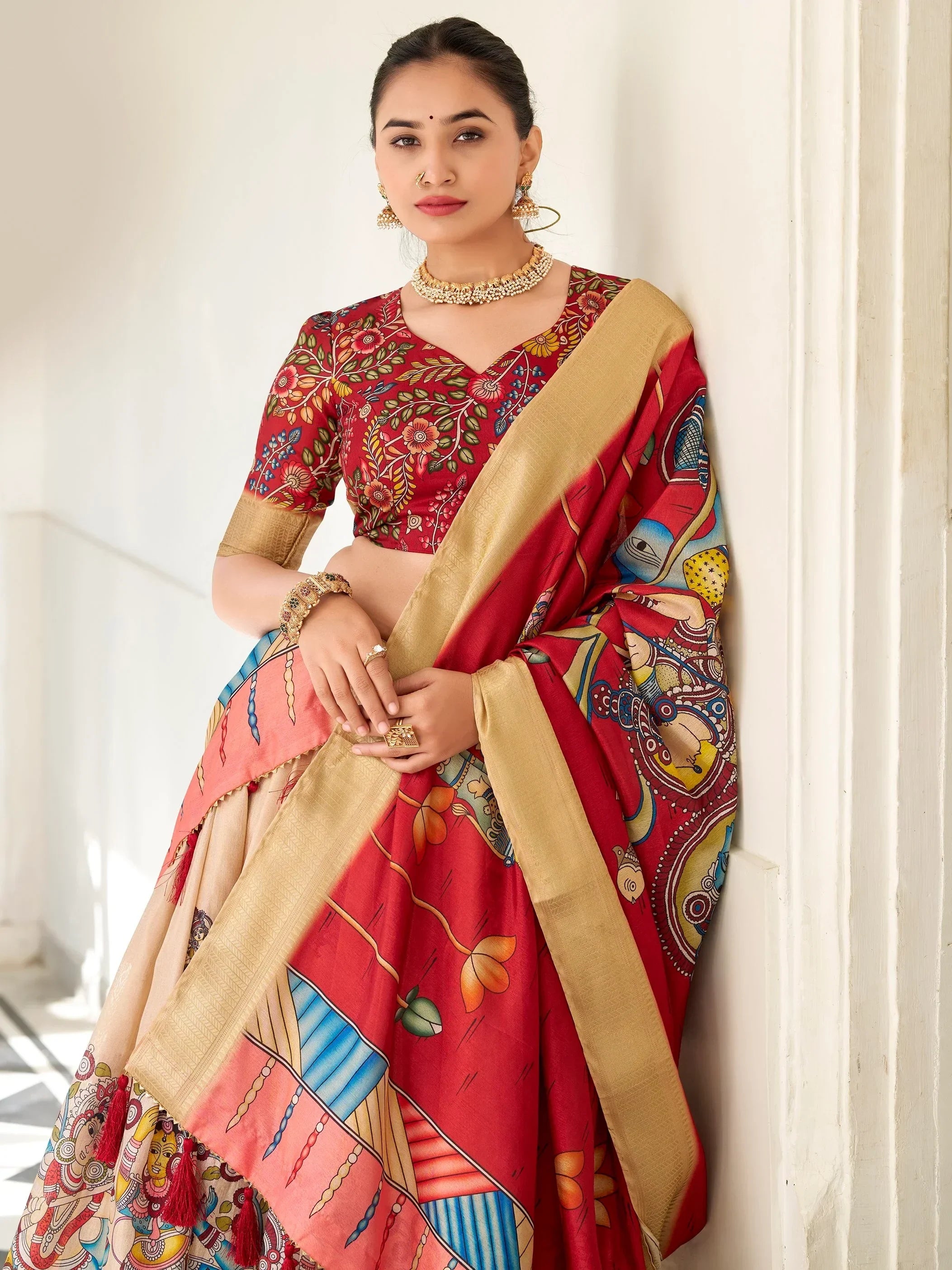 Woman in red floral printed lehenga choli with gold border, ethnic Indian wear