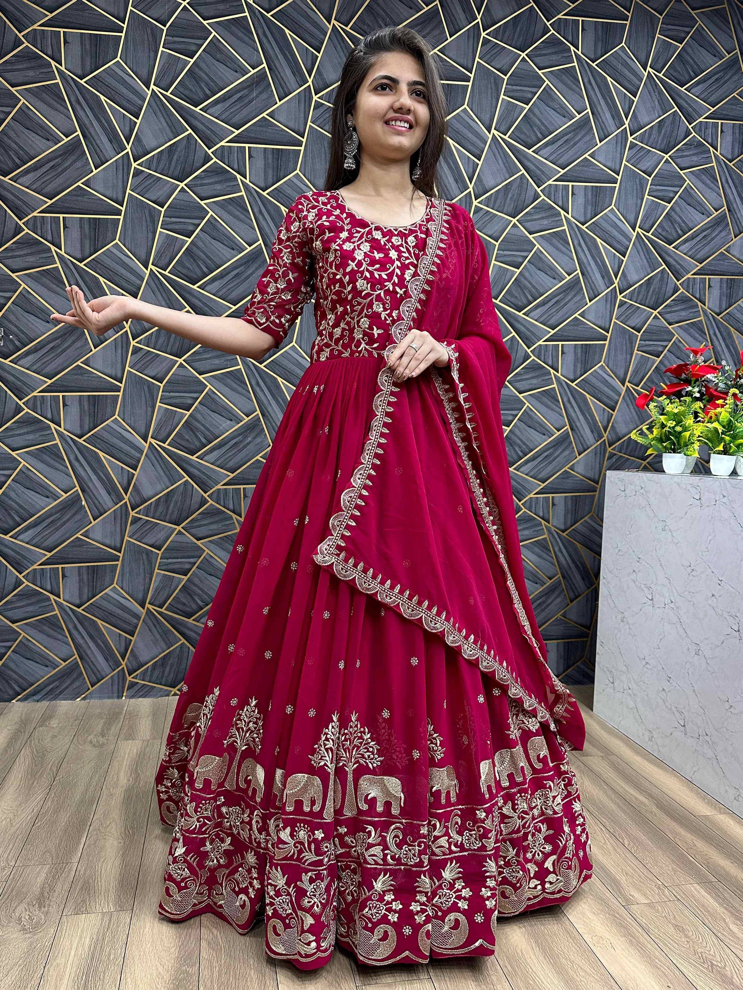 Maroon embroidered lehenga choli with elephant motifs, perfect for Indian ethnic wear and festive occasions.