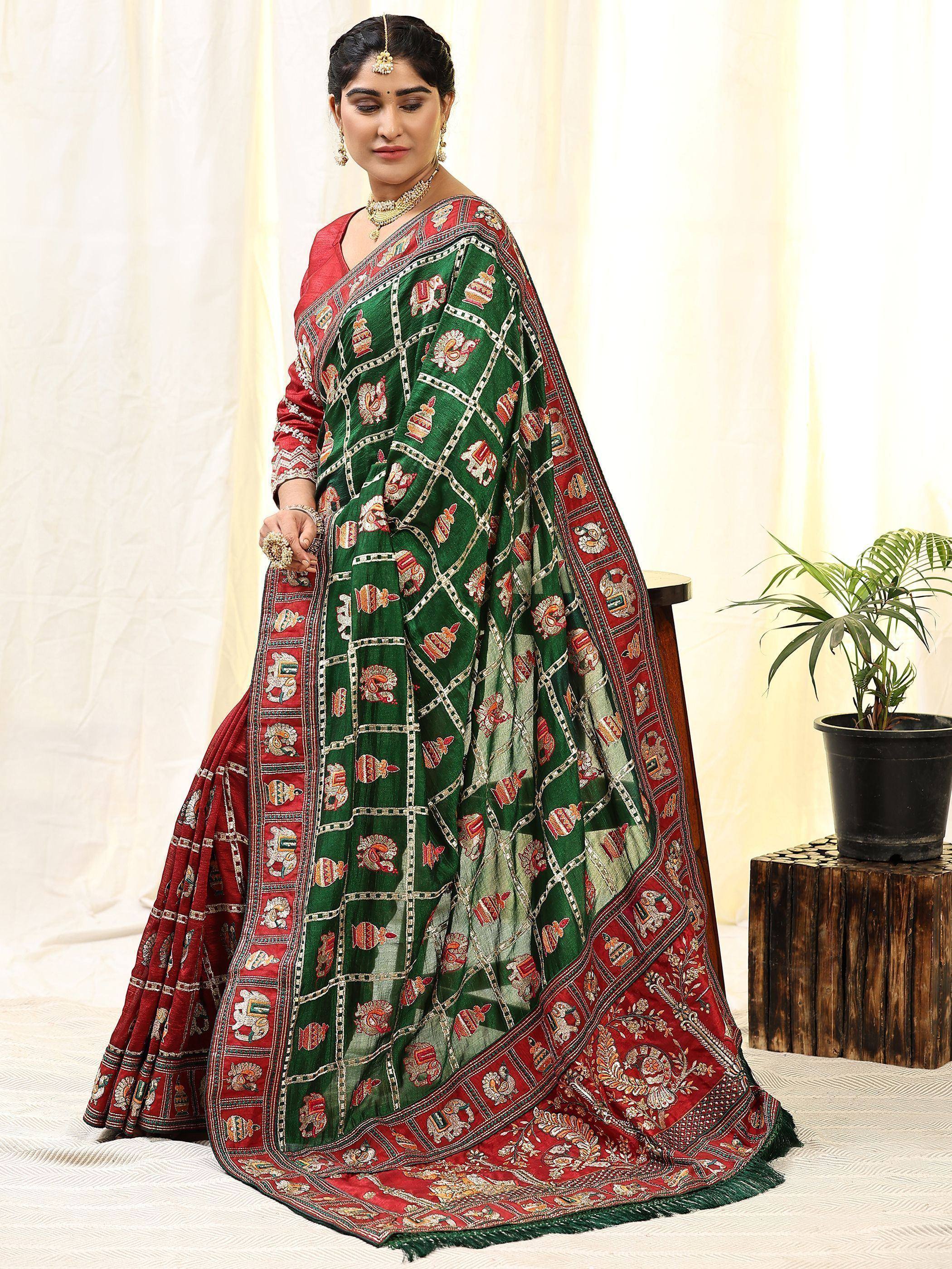 Green and red embroidered saree with elephant motifs, traditional Indian ethnic wear