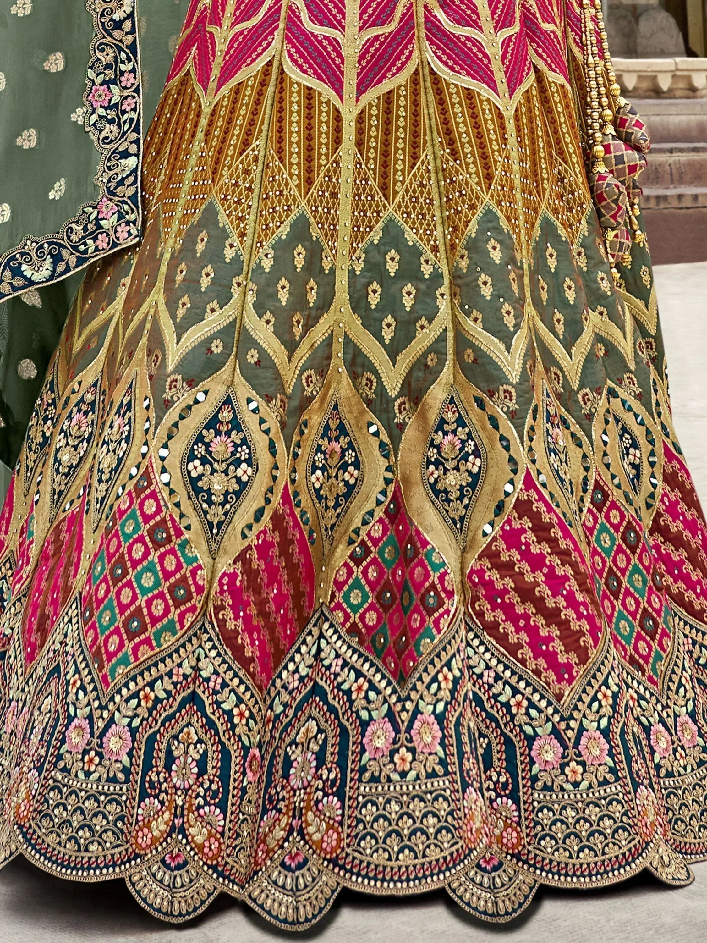 Designer lehenga choli with intricate embroidery and vibrant colors, perfect for ethnic occasions.