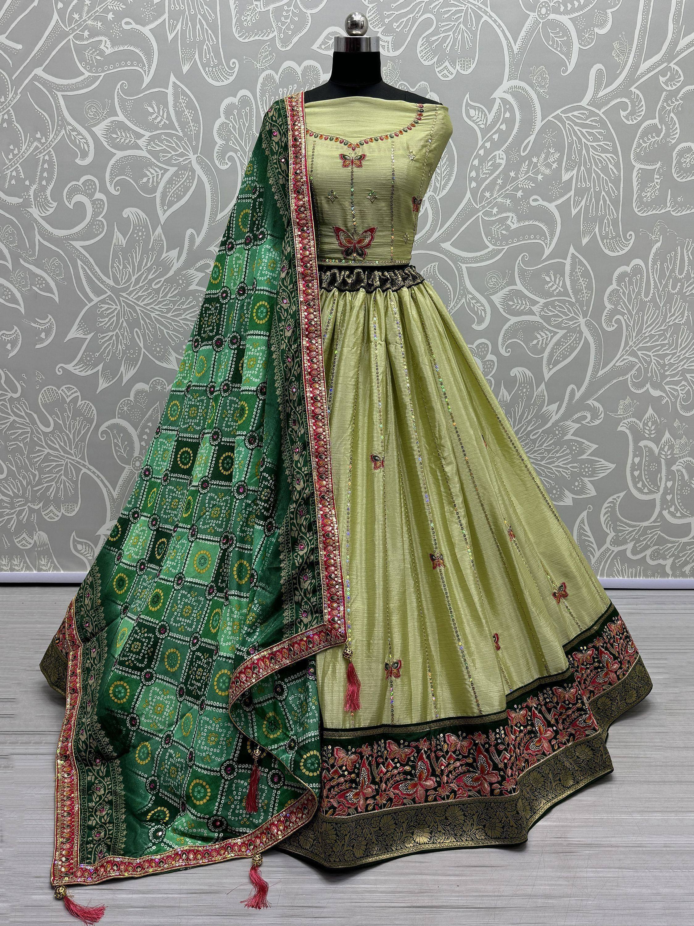 Light green designer lehenga choli with butterfly embroidery and green patterned dupatta, ethnic wear