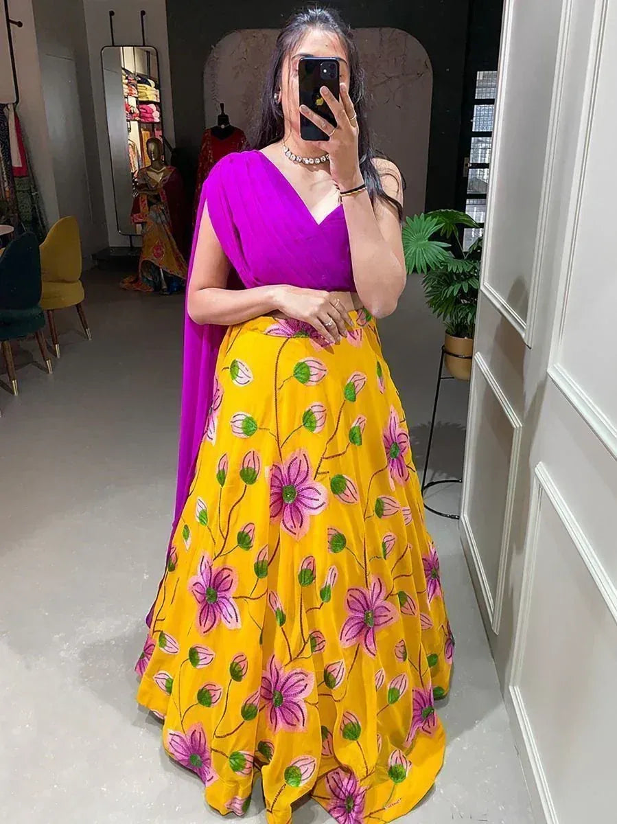 Vibrant yellow floral lehenga with magenta blouse, perfect for Indian ethnic wear occasions
