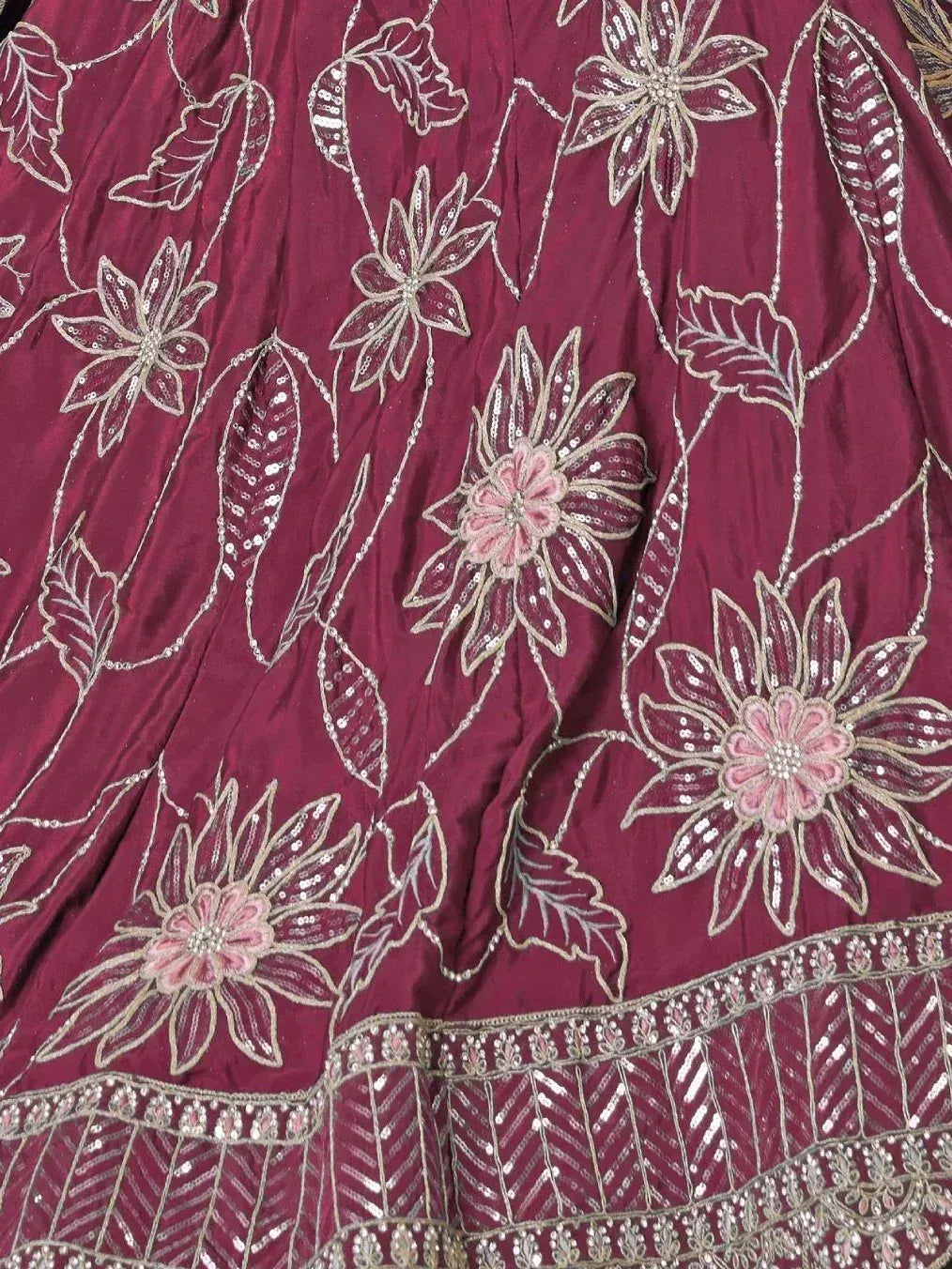 Maroon ethnic lehenga with floral sequin embroidery and pink accents