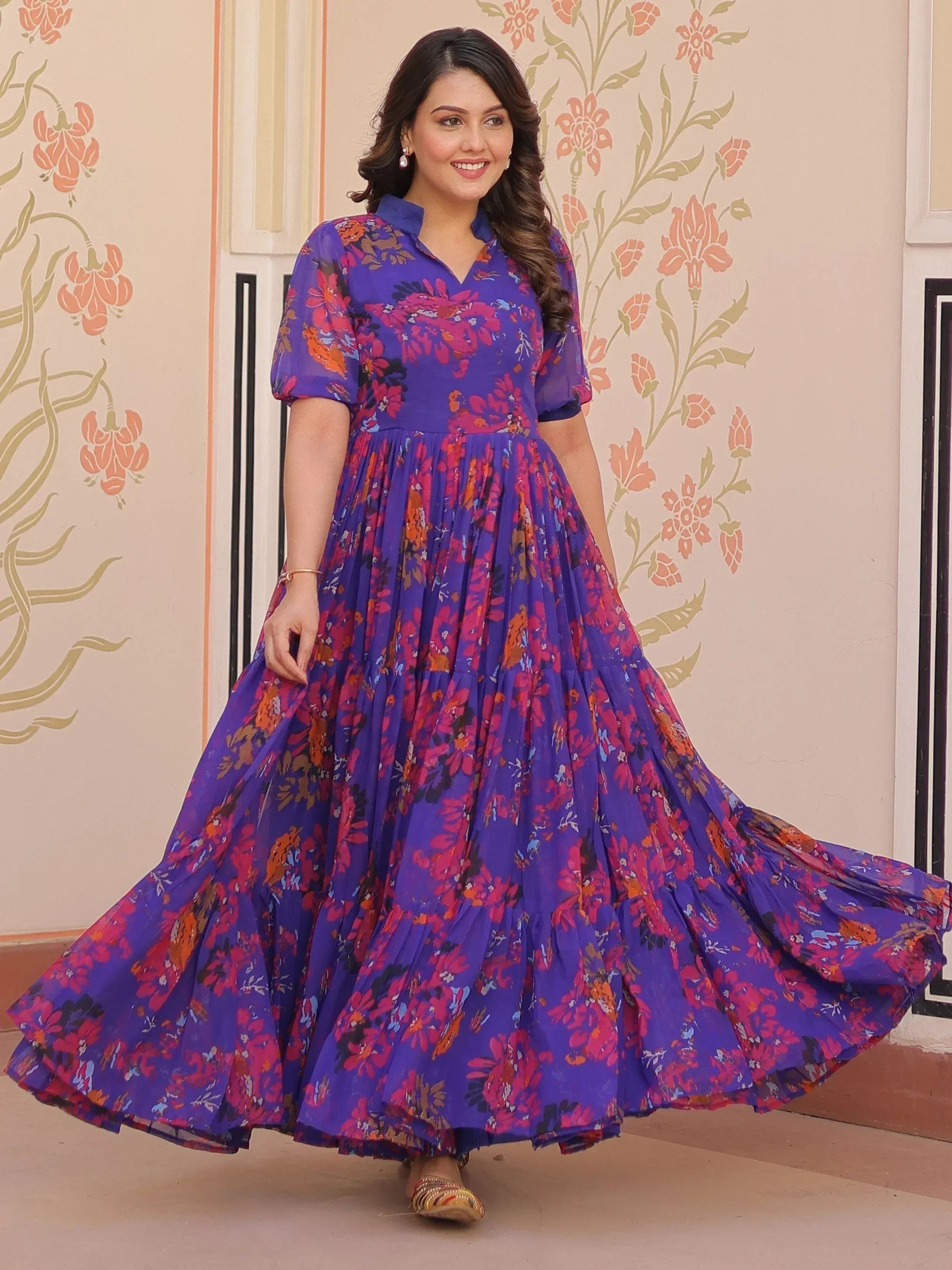 Purple floral ethnic gown with pleated skirt, perfect for Indian occasions and festive wear.