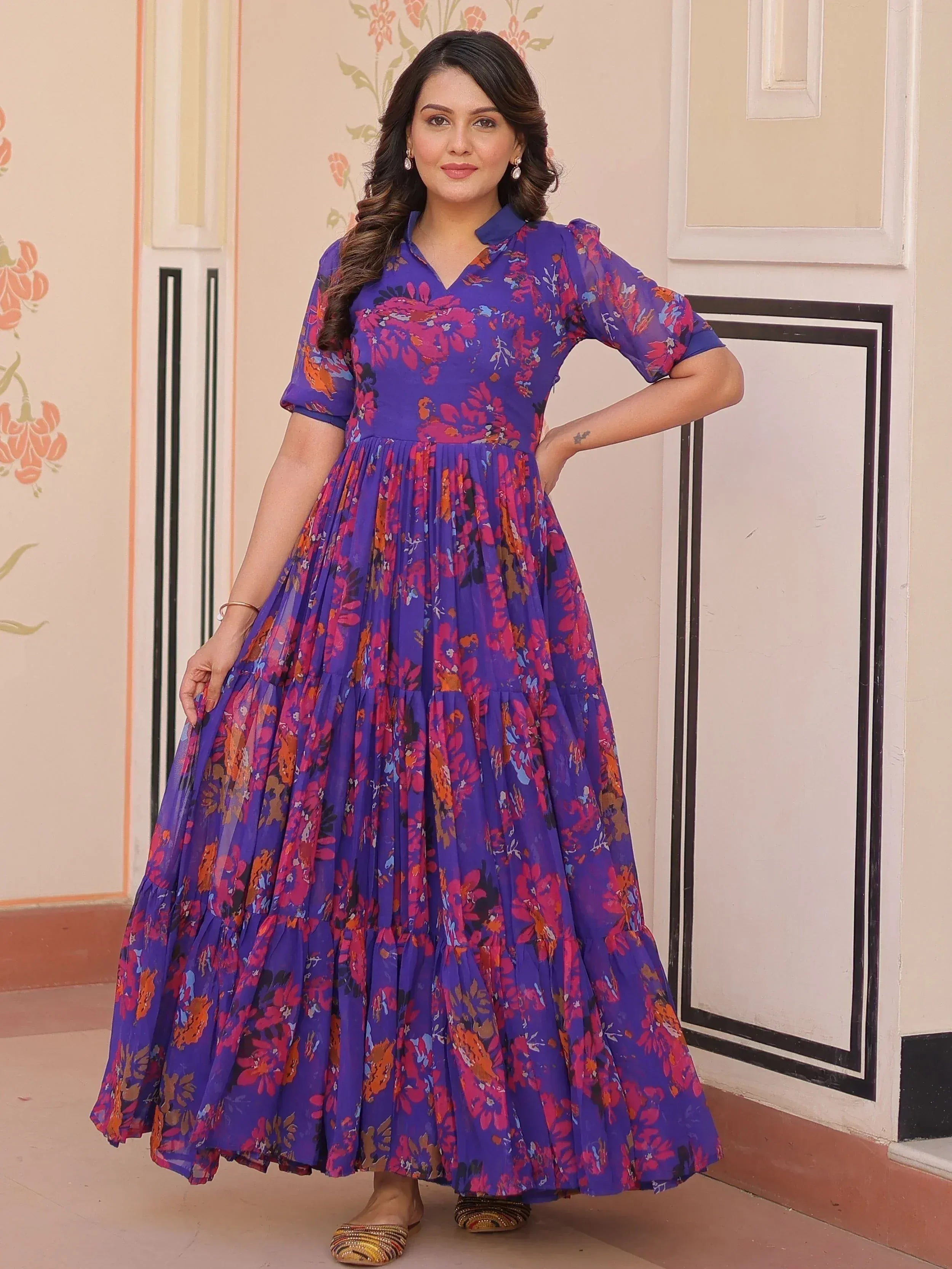 Purple floral ethnic gown with tiered skirt, perfect for Indian occasions and festive wear