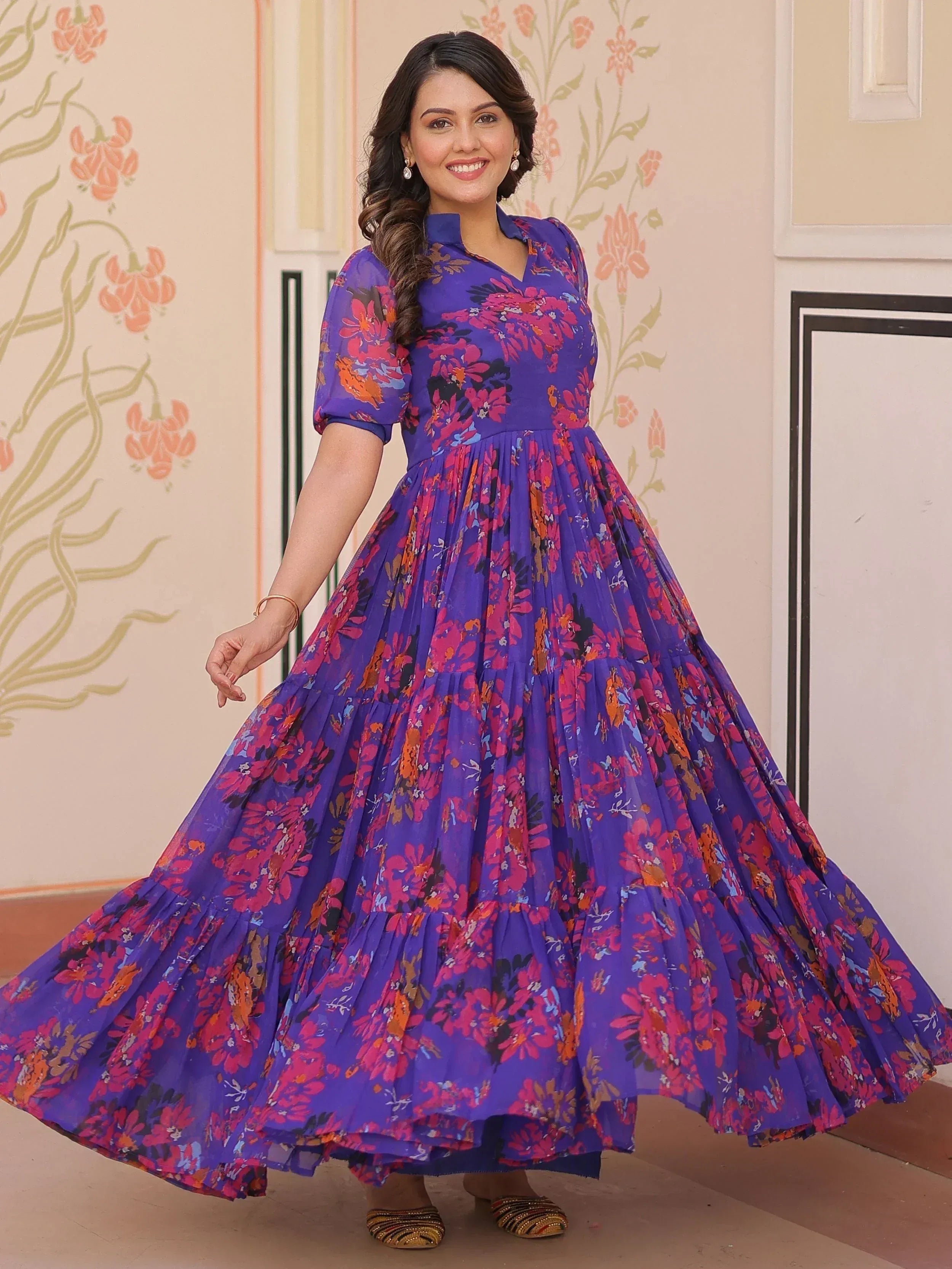 Purple floral ethnic gown with tiered skirt, perfect for Indian occasions and festive wear.