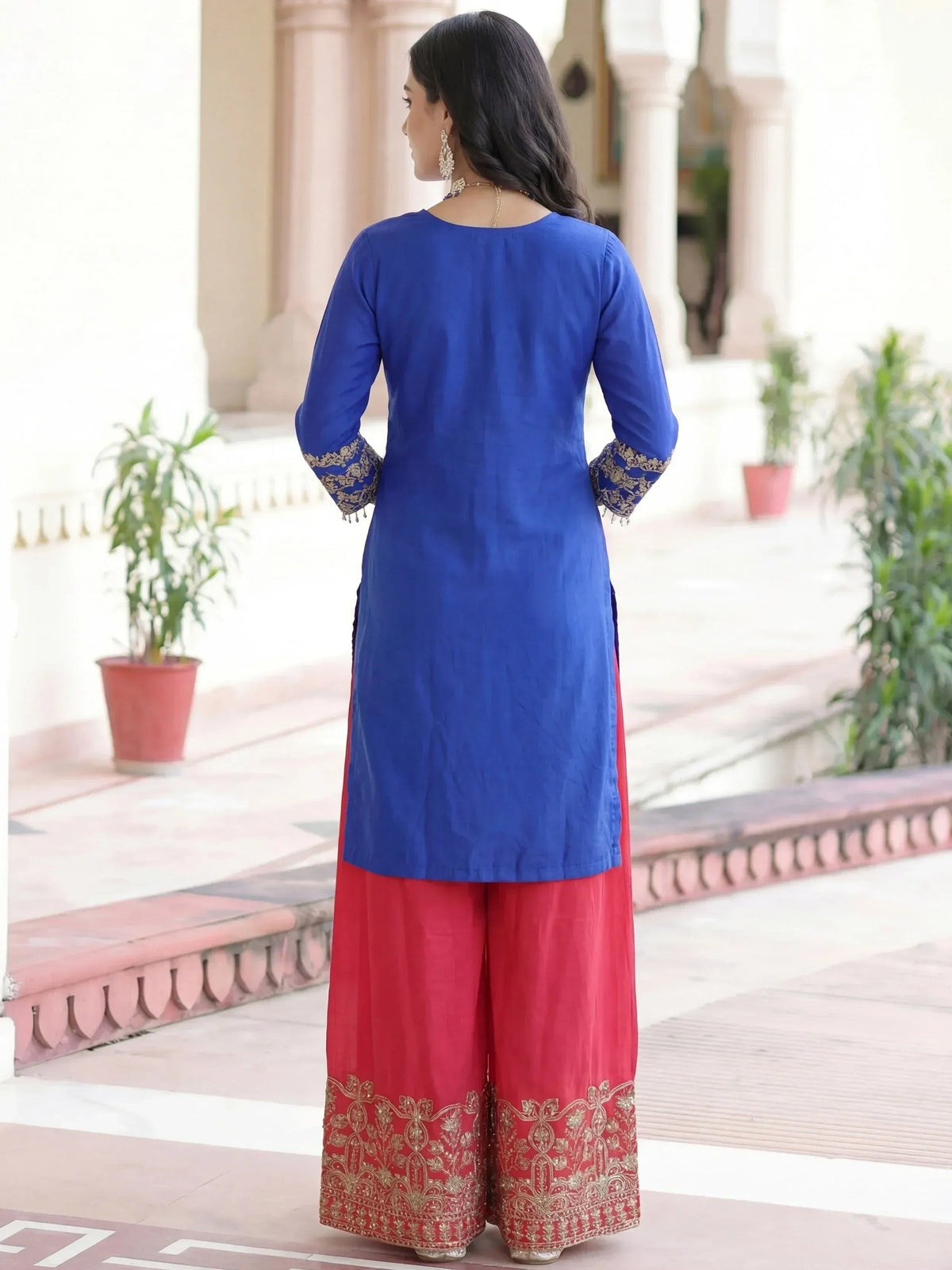 Blue kurta with gold embroidery and red palazzo pants, ethnic Indian wear