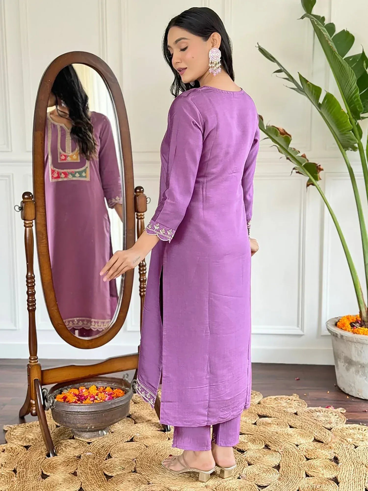 Purple ethnic kurta with embroidery, paired with matching pants, styled for Indian wear