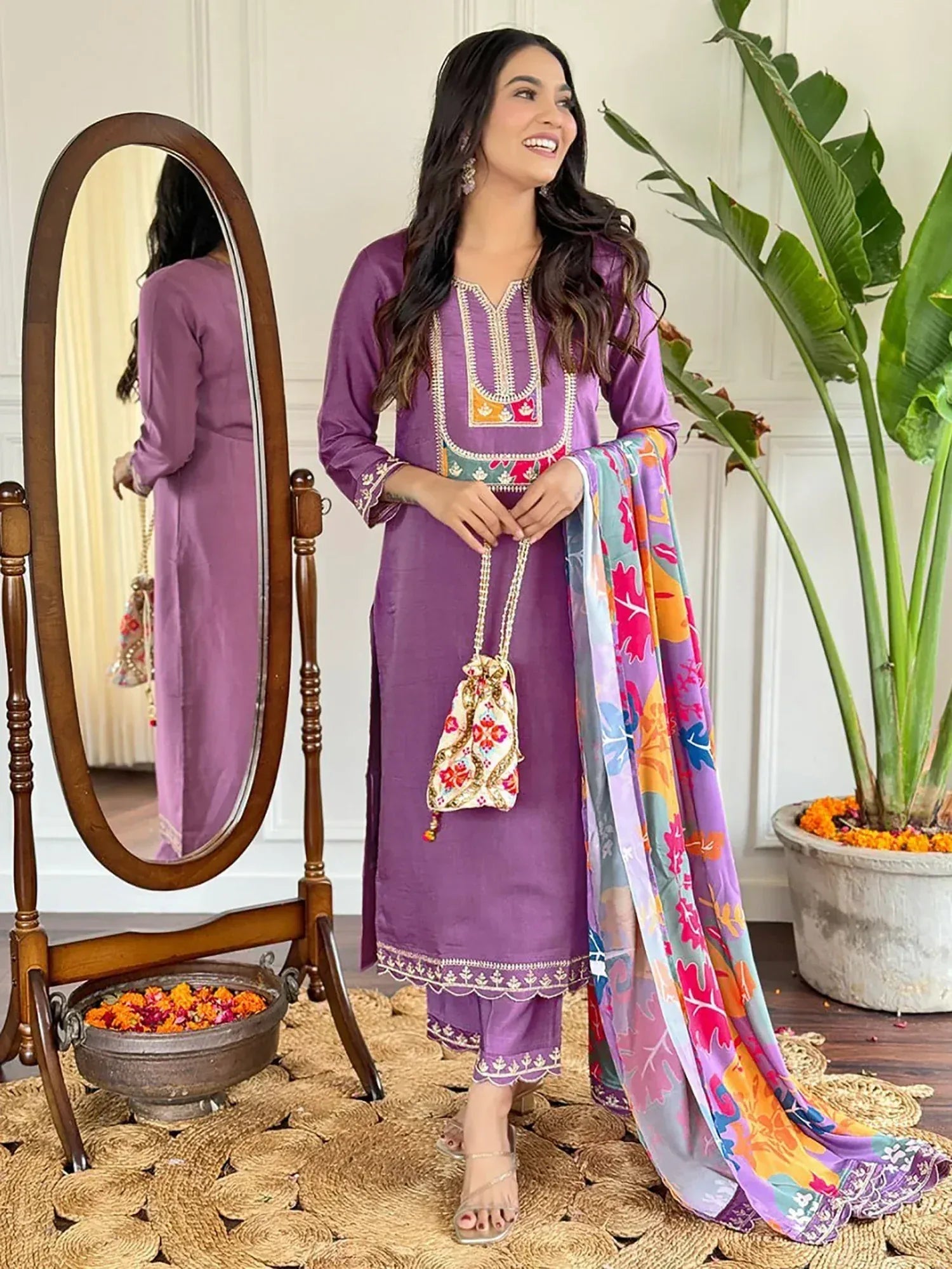 Purple embroidered salwar kameez with floral dupatta, perfect for Indian ethnic wear occasions