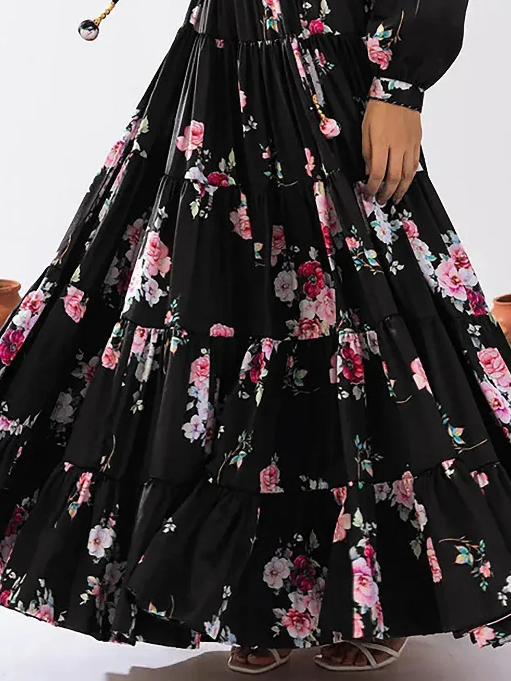 Black floral print tiered ethnic gown with long sleeves, perfect for Indian occasions