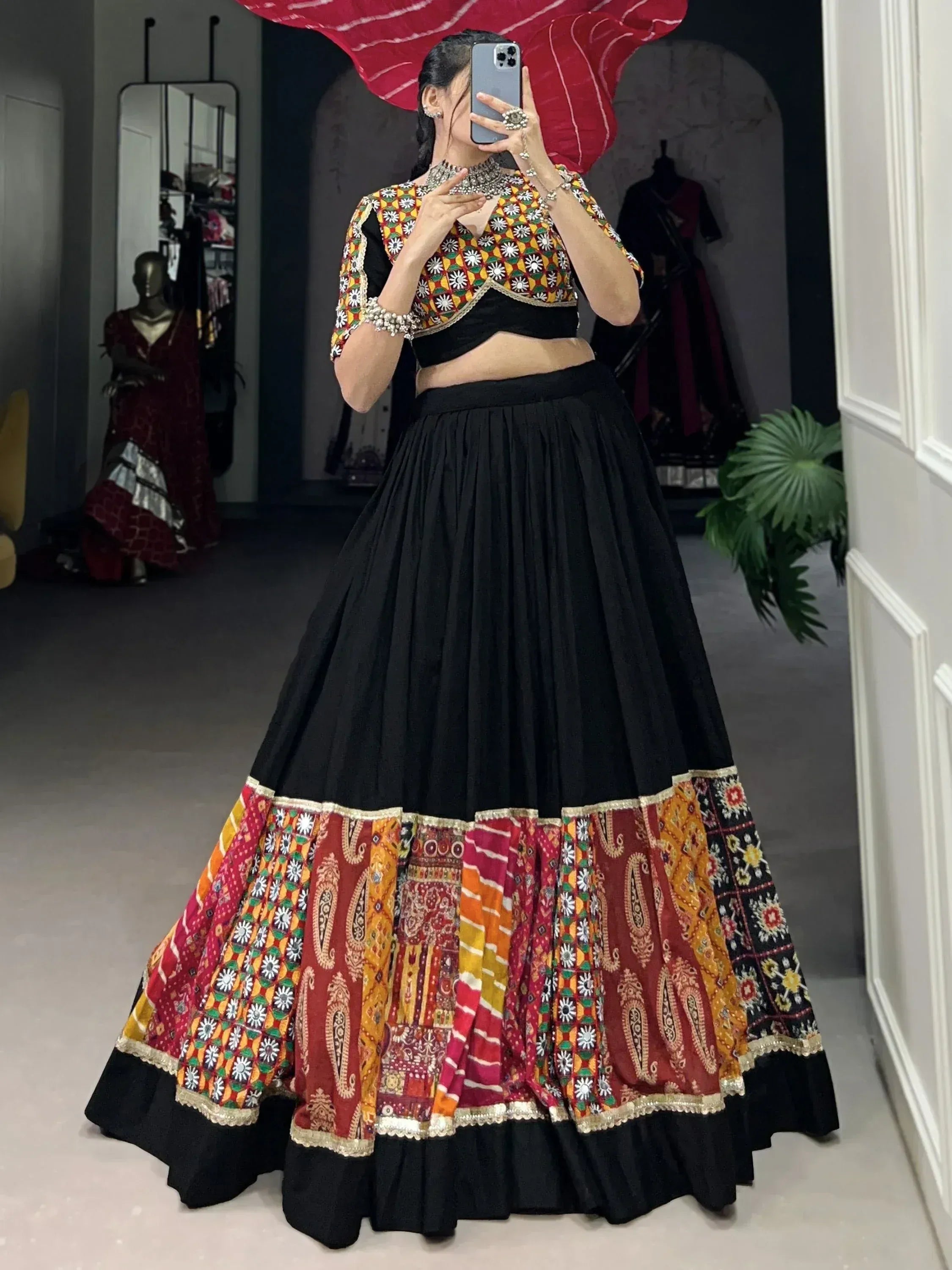Black lehenga with colorful embroidered border and matching blouse, Indian ethnic wear