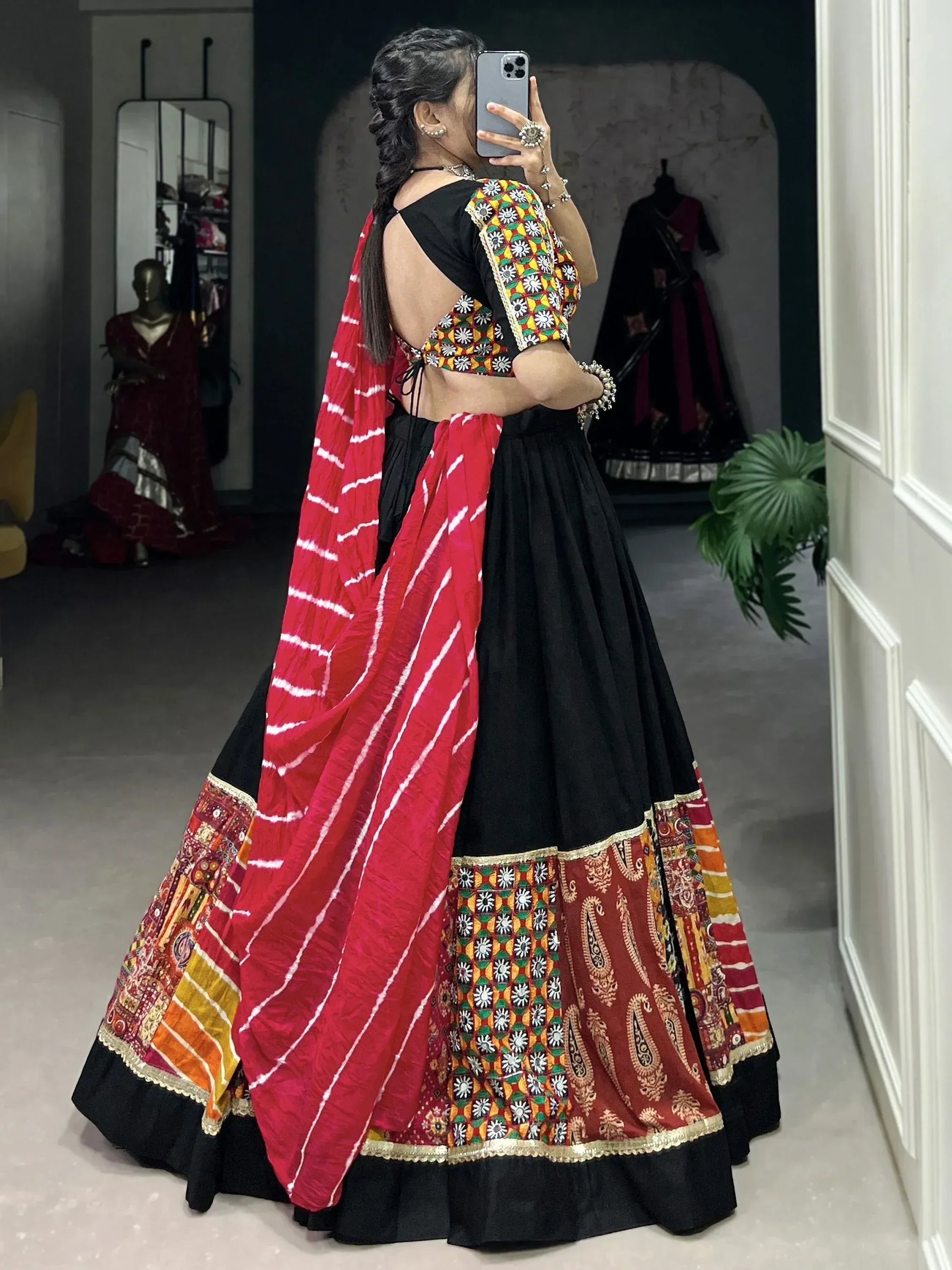 Black and red embroidered lehenga choli with mirror work, tie-dye dupatta, ethnic Indian wear