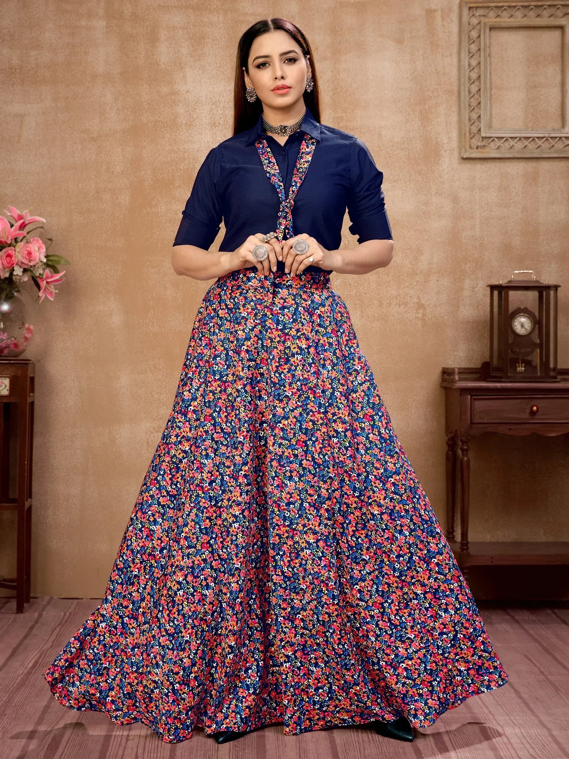 Navy blue floral print ethnic gown with tie-up neckline, perfect for Indian occasions