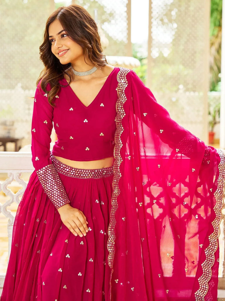 Fuchsia designer lehenga choli with sequin embroidery and sheer dupatta for Indian ethnic wear