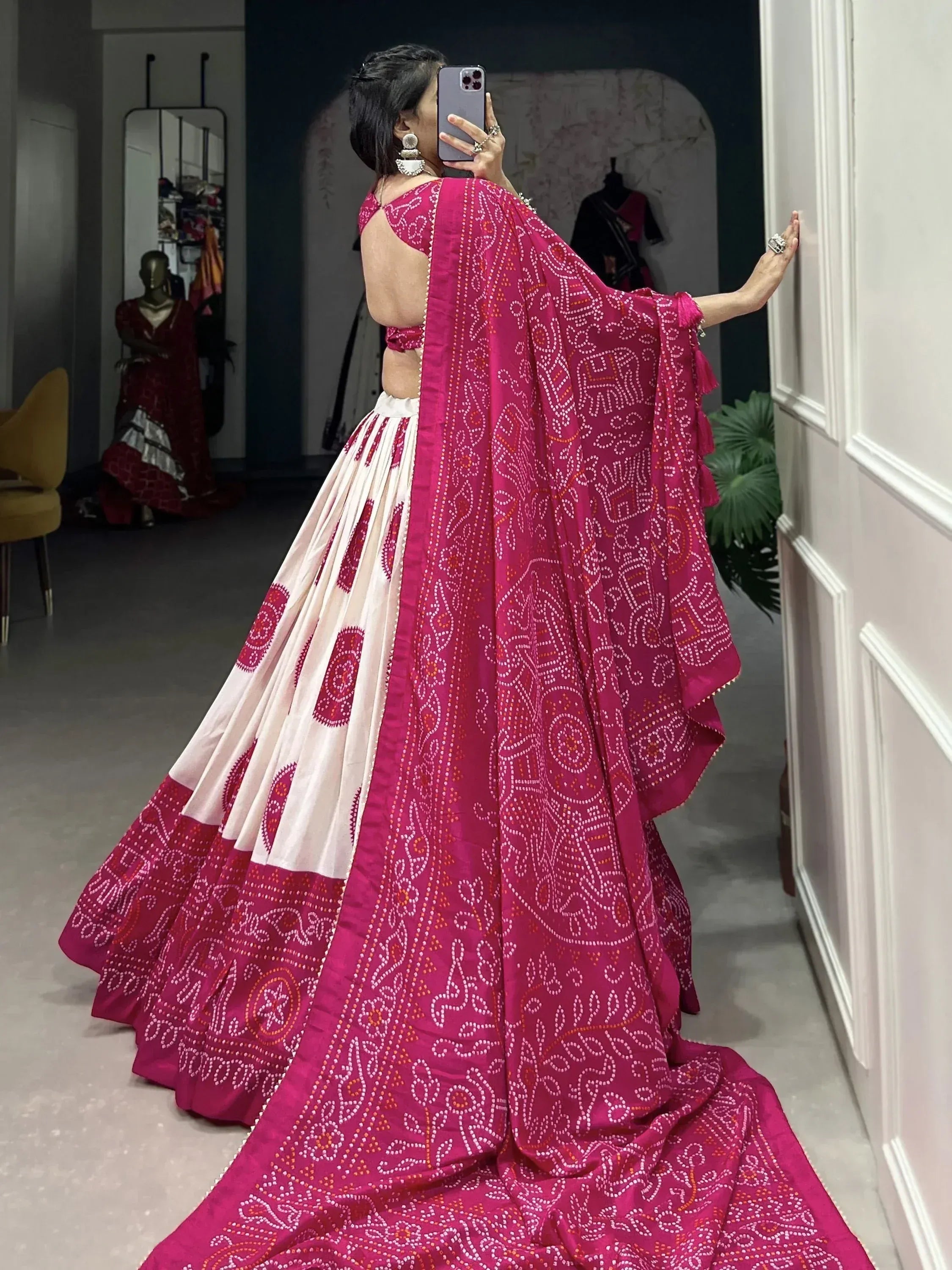 Pink and white embroidered lehenga choli with mirror work, perfect for Indian ethnic wear occasions