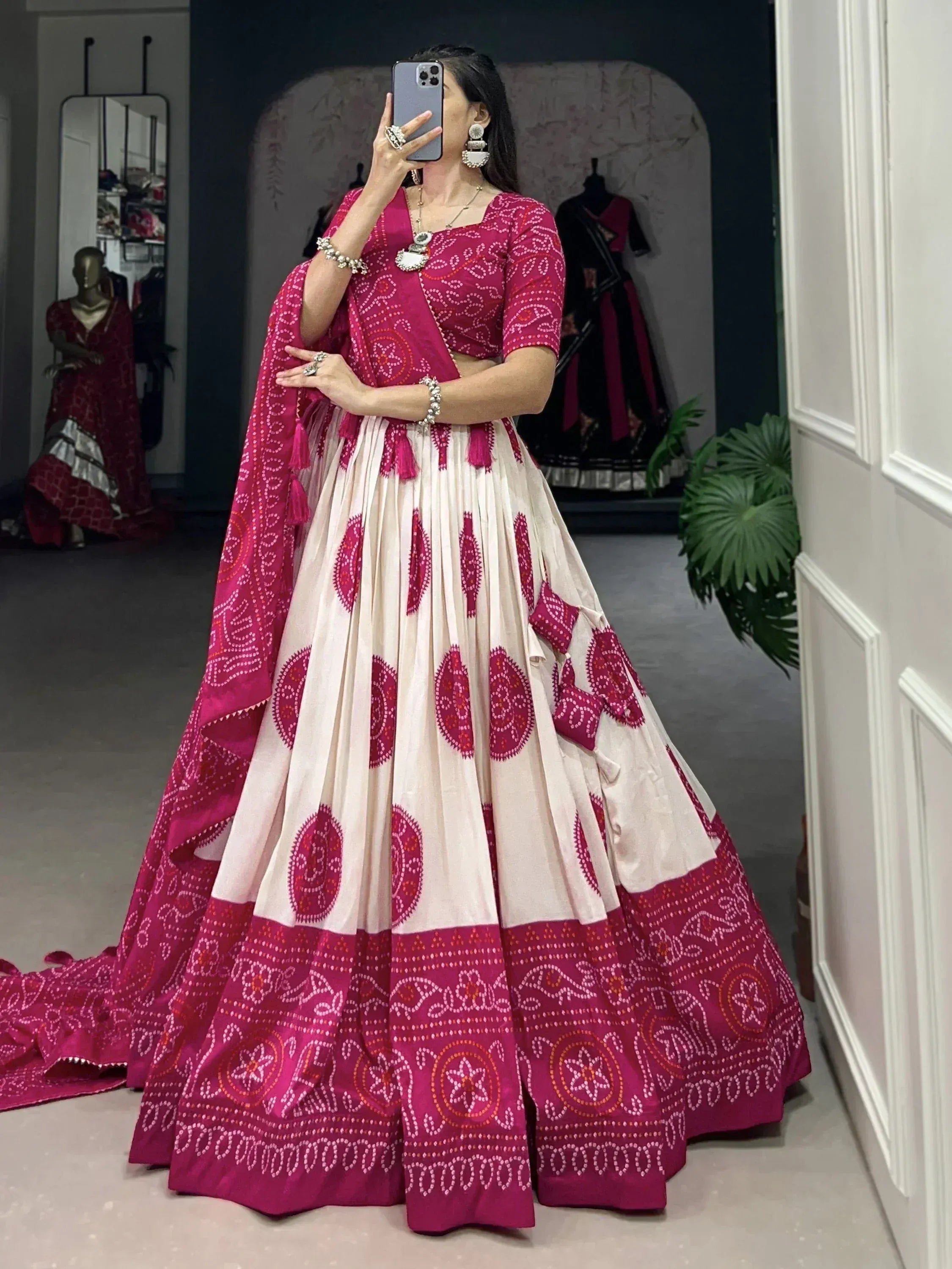Pink and cream Bandhani print lehenga choli with mirror work, perfect for Indian ethnic wear occasions