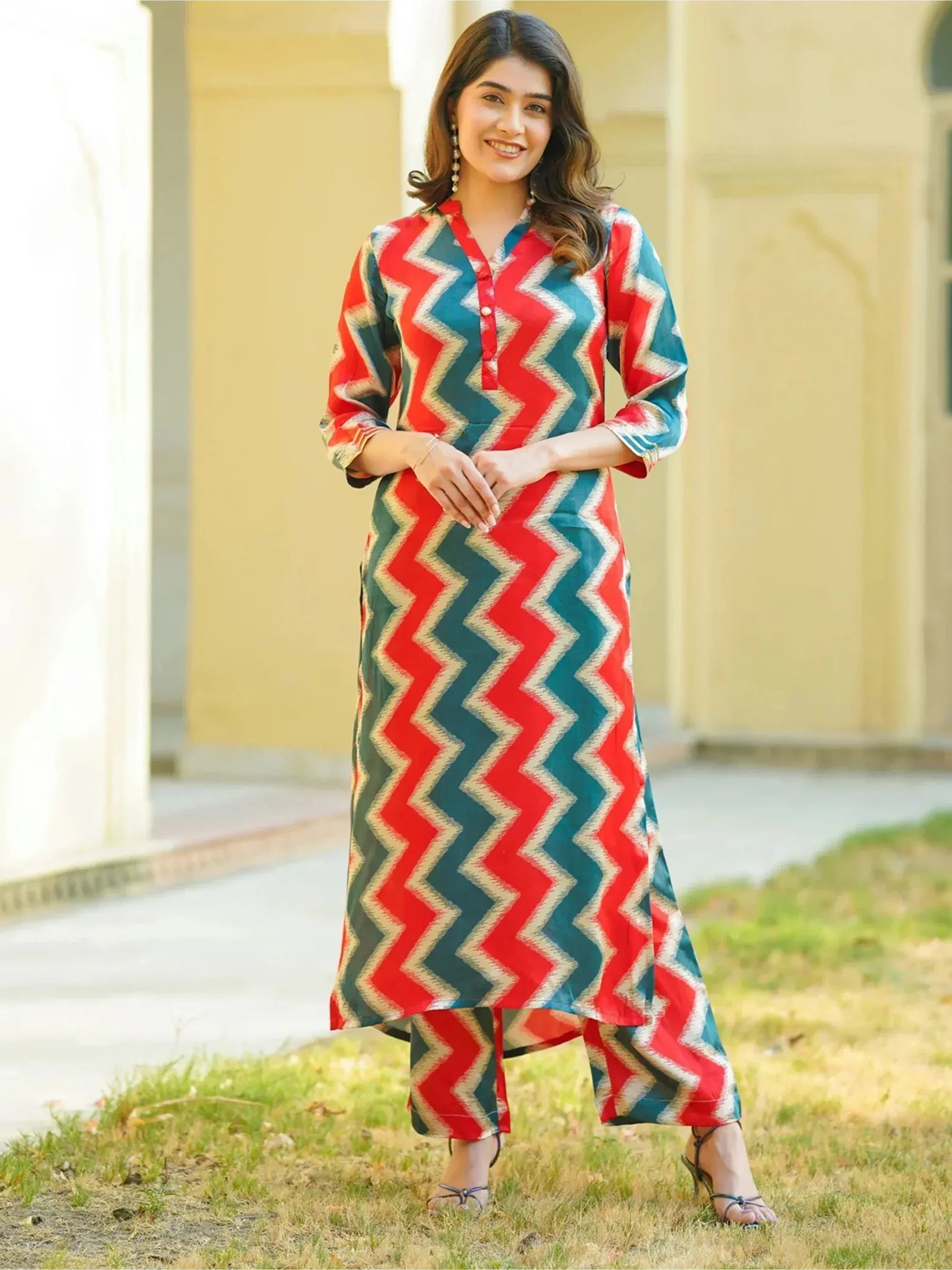 Woman in red and teal zigzag print ethnic kurta set with palazzo pants, stylish Indian wear
