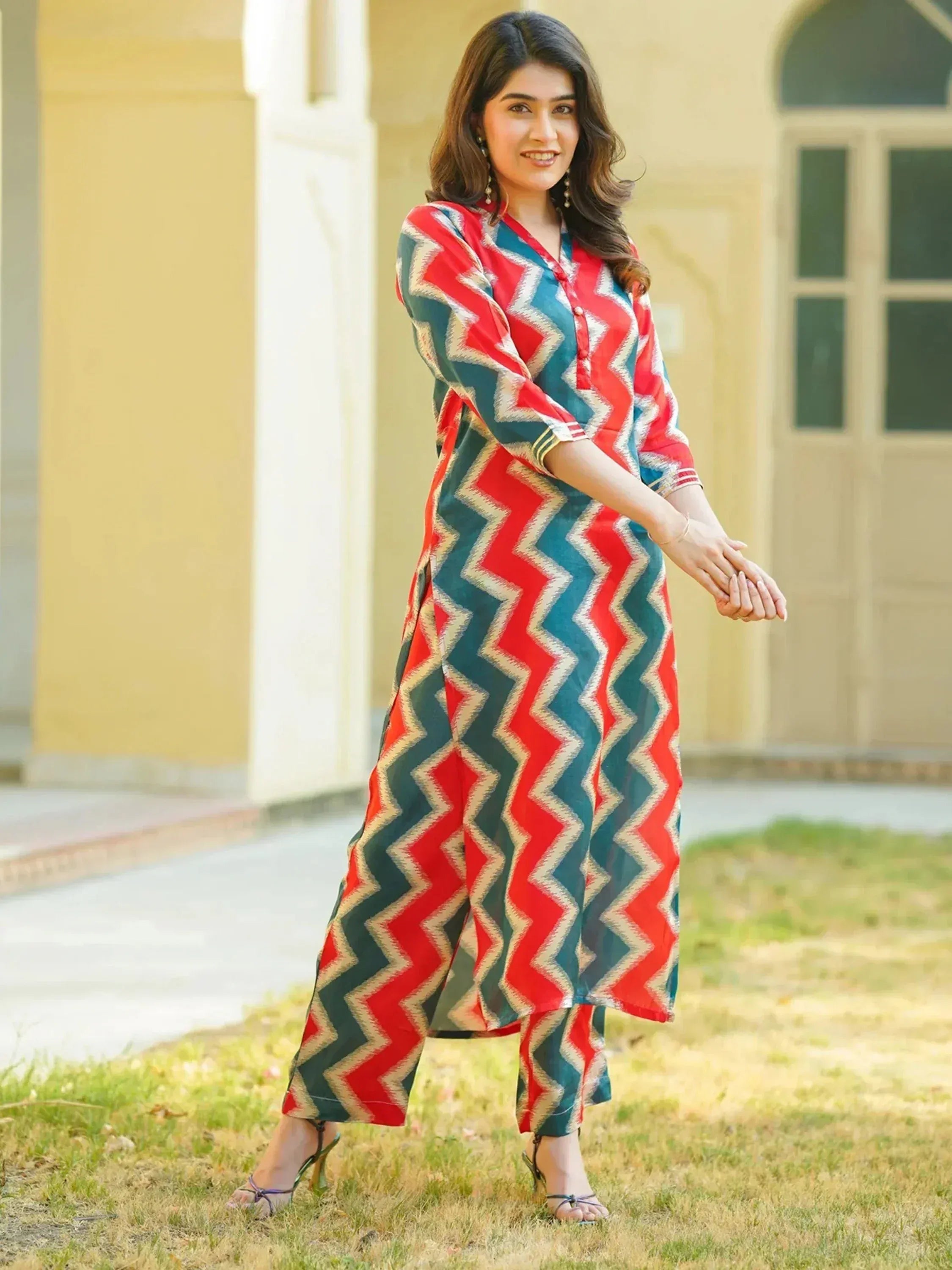 Woman in red and teal zigzag print salwar kameez, ethnic wear for women