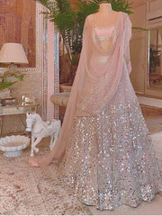 Peach Sequins Work Net Wedding Wear Lehenga Choli