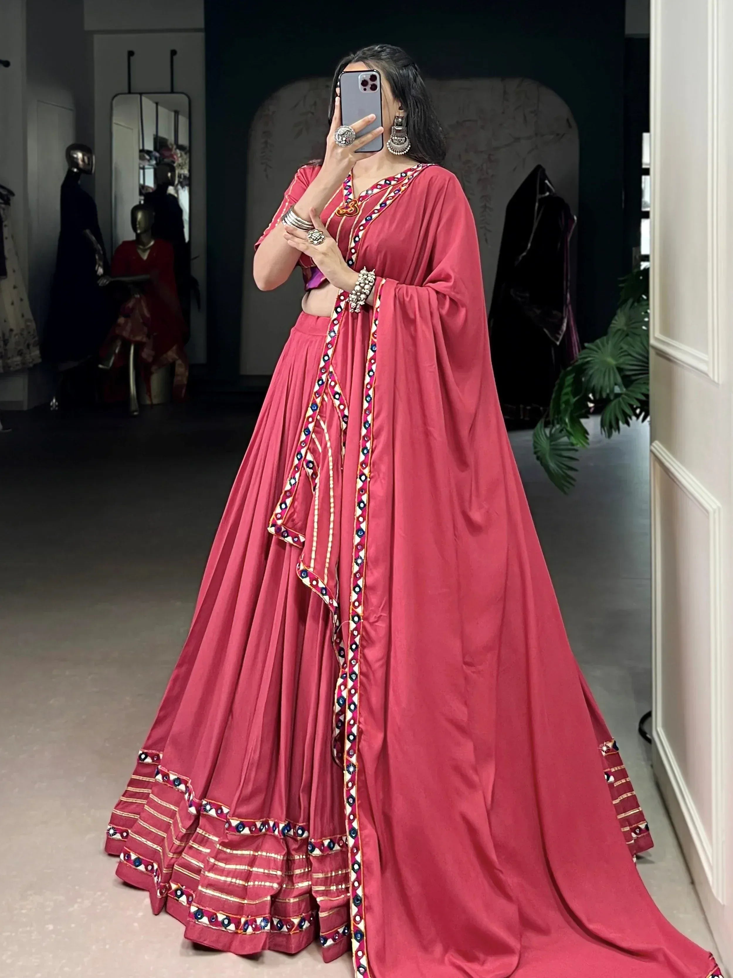 Pink embroidered lehenga choli with mirror work, perfect for Indian ethnic wear and festive occasions