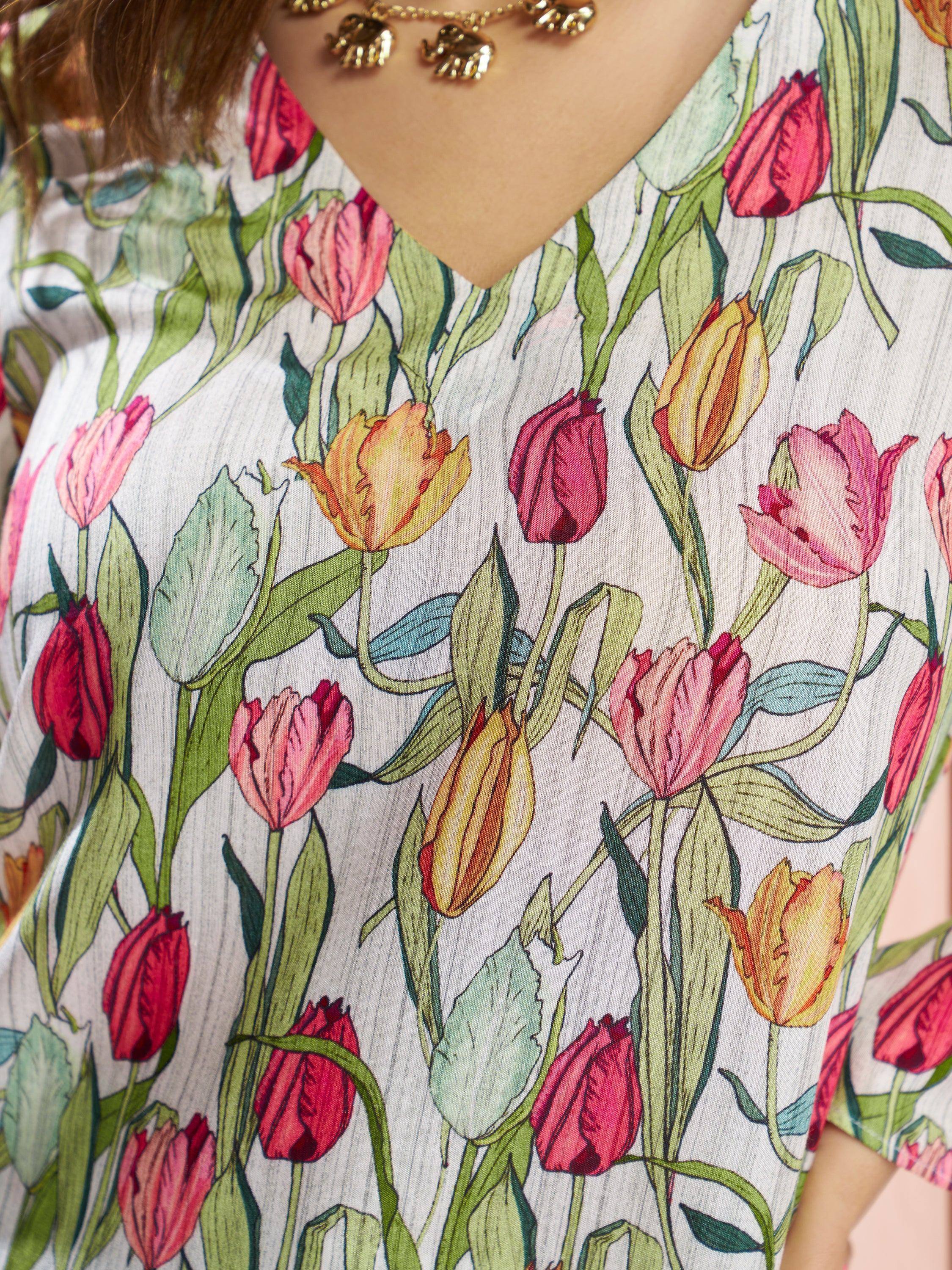 Floral print ethnic gown with tulip design, perfect for Indian occasions and festive wear.