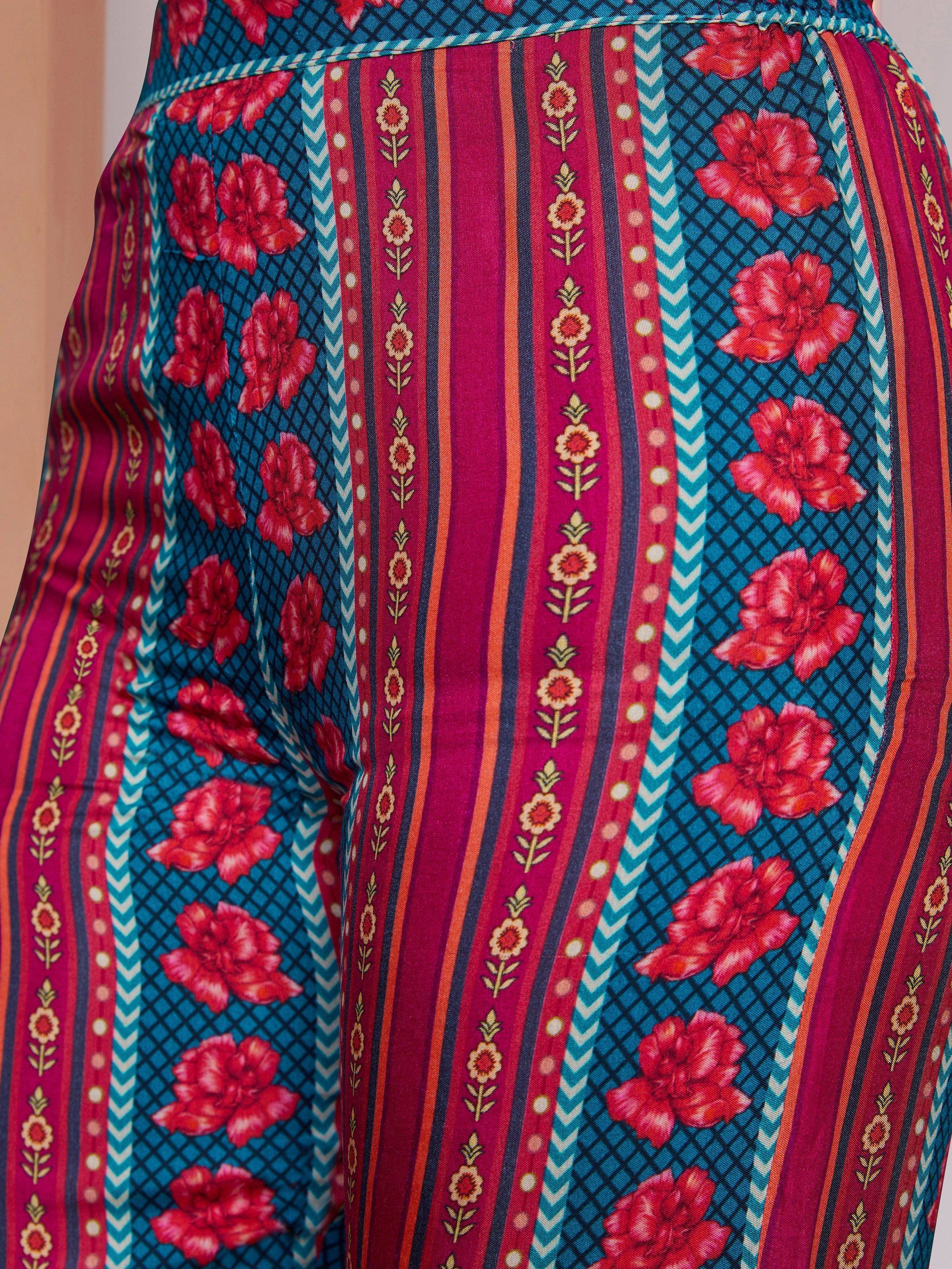 Vibrant floral and striped ethnic palazzo pants with bold red, blue, and pink patterns