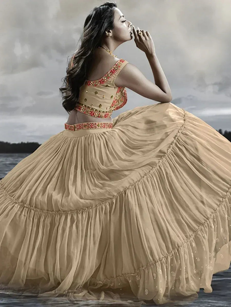 Beige designer lehenga choli with floral embroidery, perfect for Indian ethnic wear events