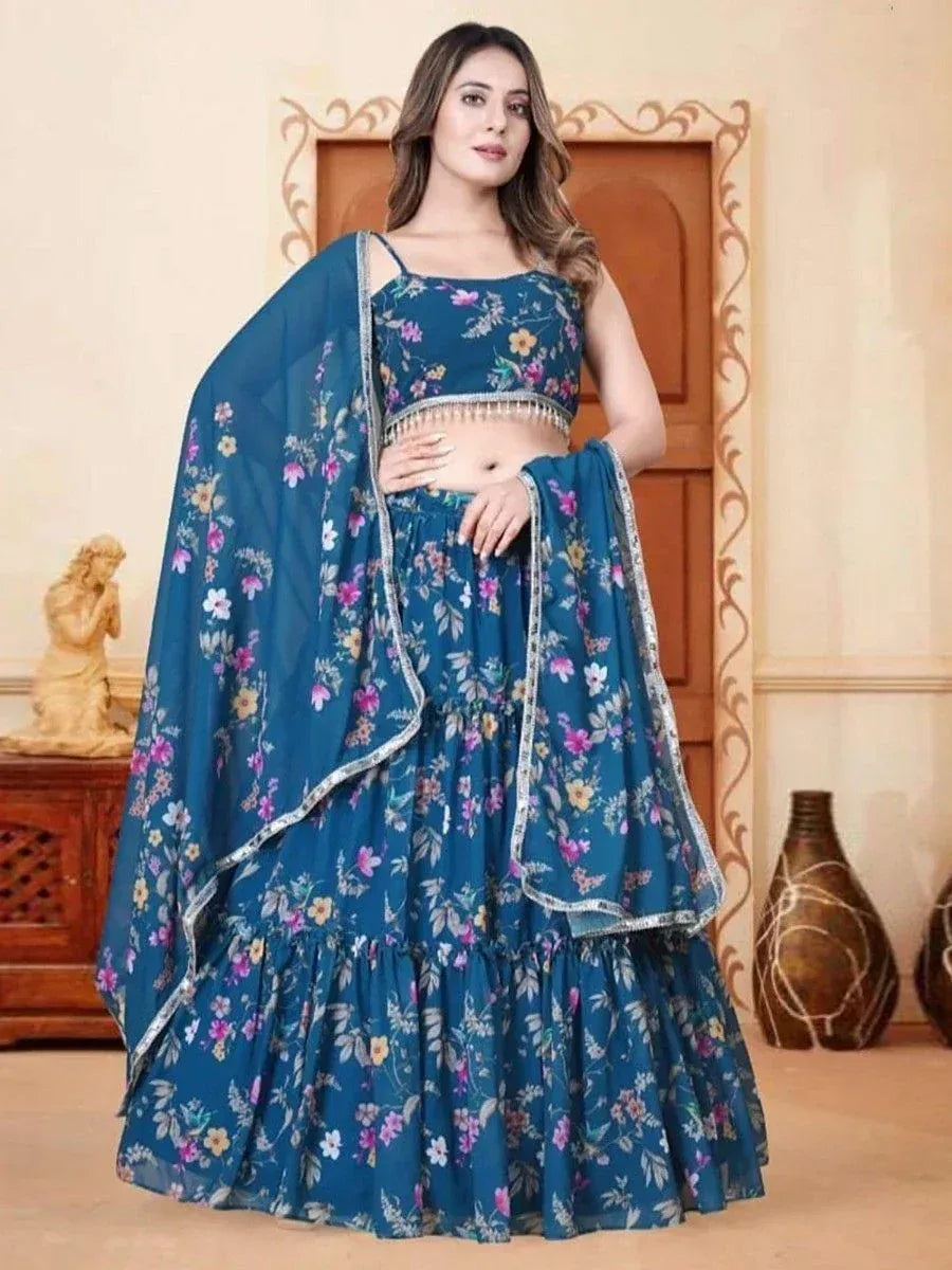Blue floral lehenga choli with ruffled skirt and dupatta, perfect for Indian ethnic occasions