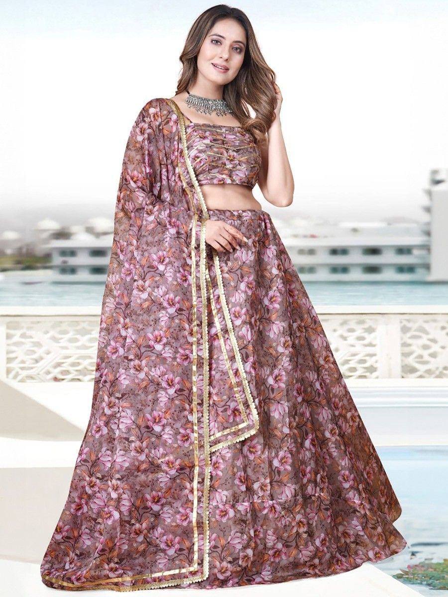 Floral print lehenga choli with gold trim, perfect for Indian ethnic wear occasions