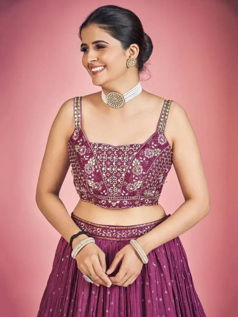 Purple embroidered lehenga choli with floral motifs, perfect for Indian ethnic wear occasions