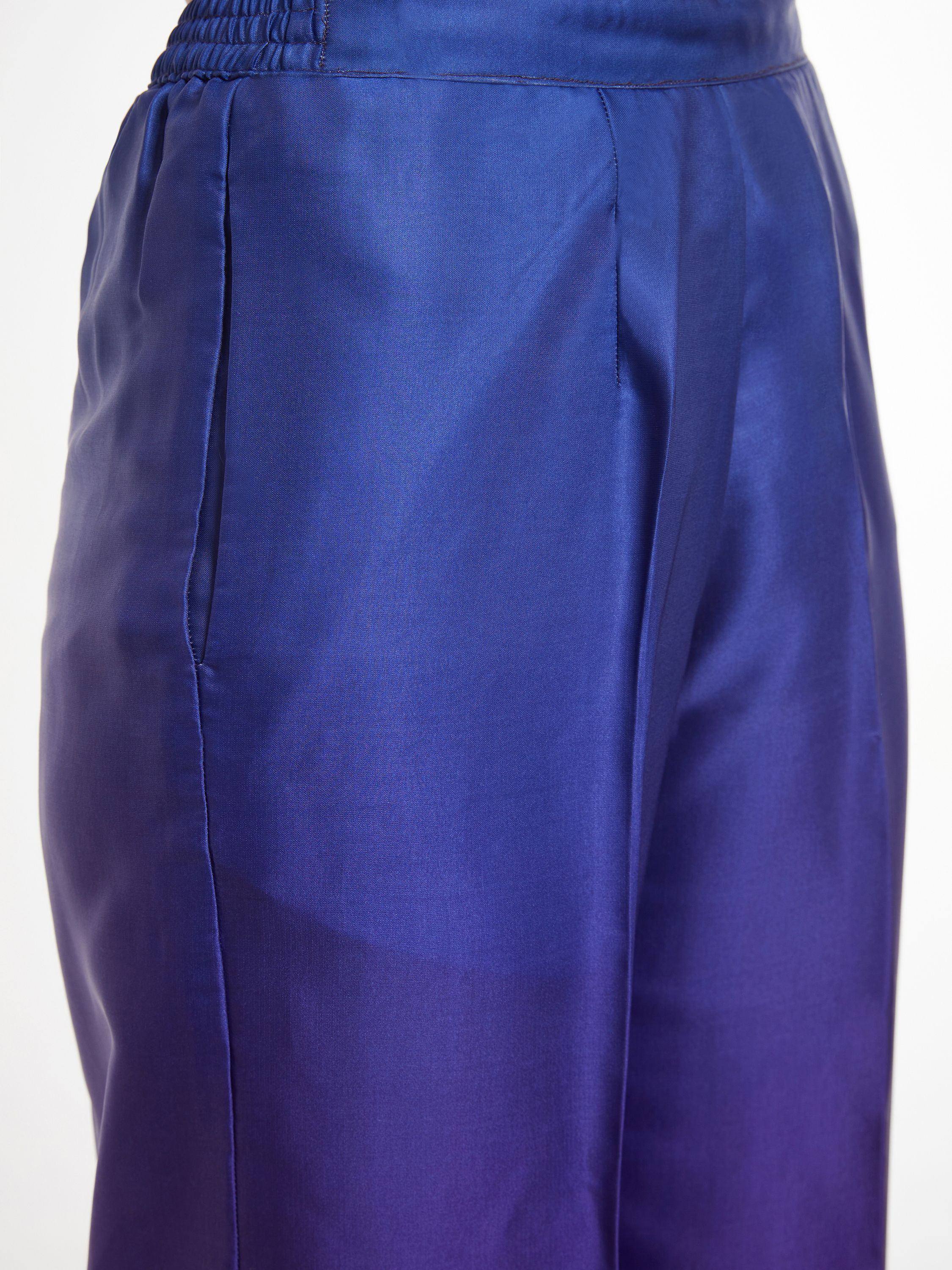 Royal blue satin palazzo pants with elastic waistband, ideal for ethnic wear outfits