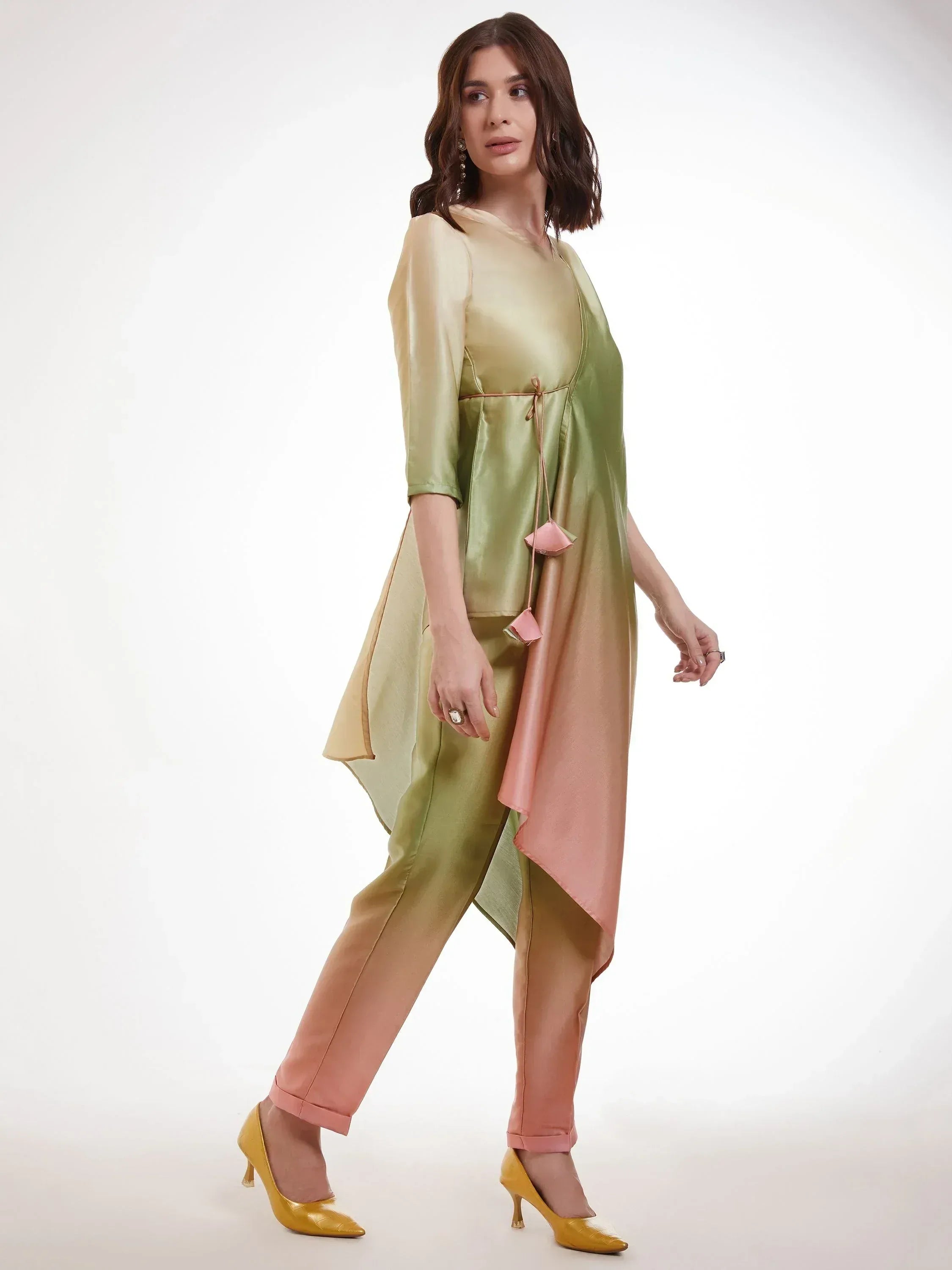 Woman in pastel ombre kurta set with tapered pants and yellow heels, Indian ethnic wear