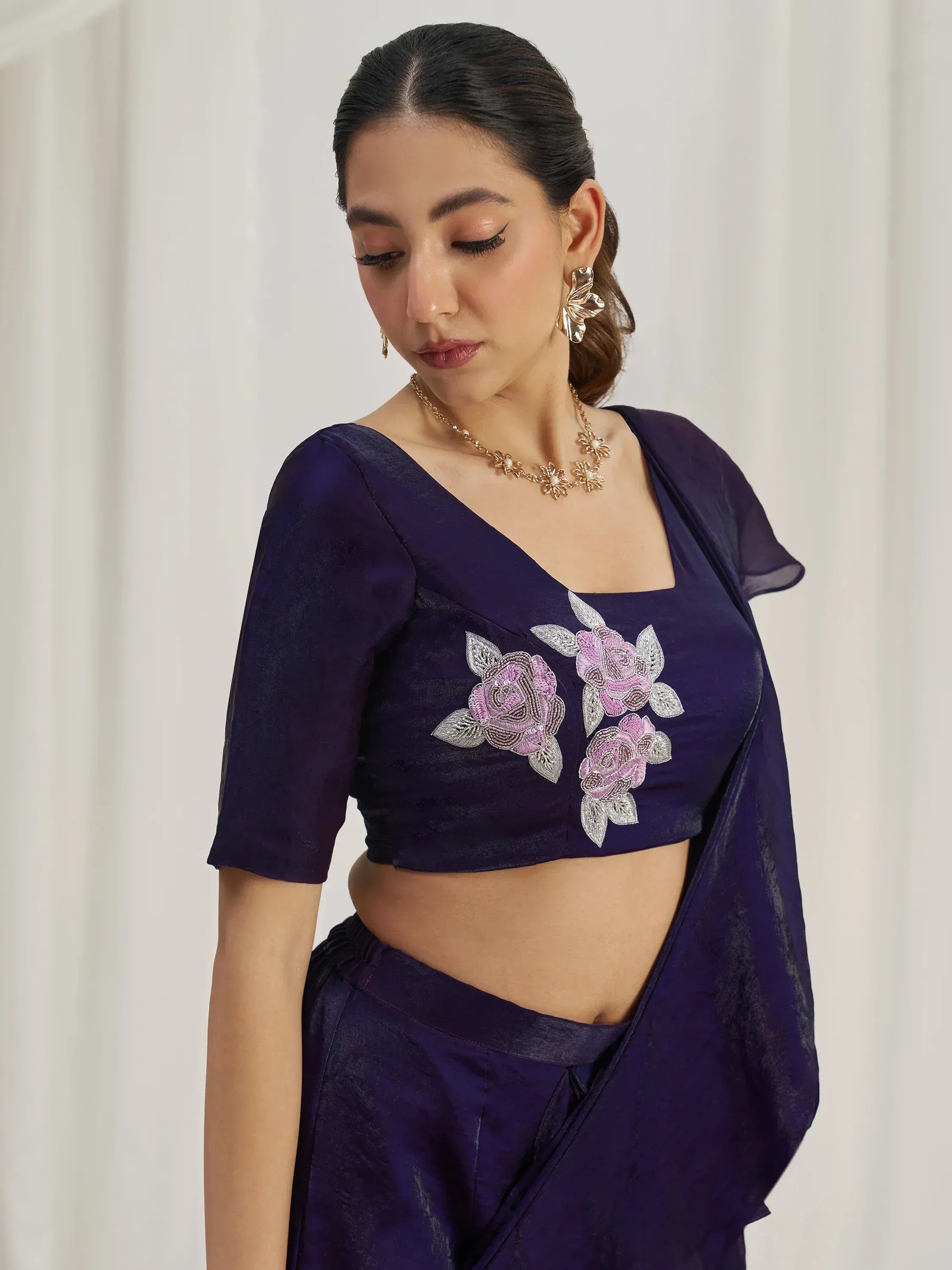 Purple saree with floral embroidery and matching blouse, elegant ethnic wear