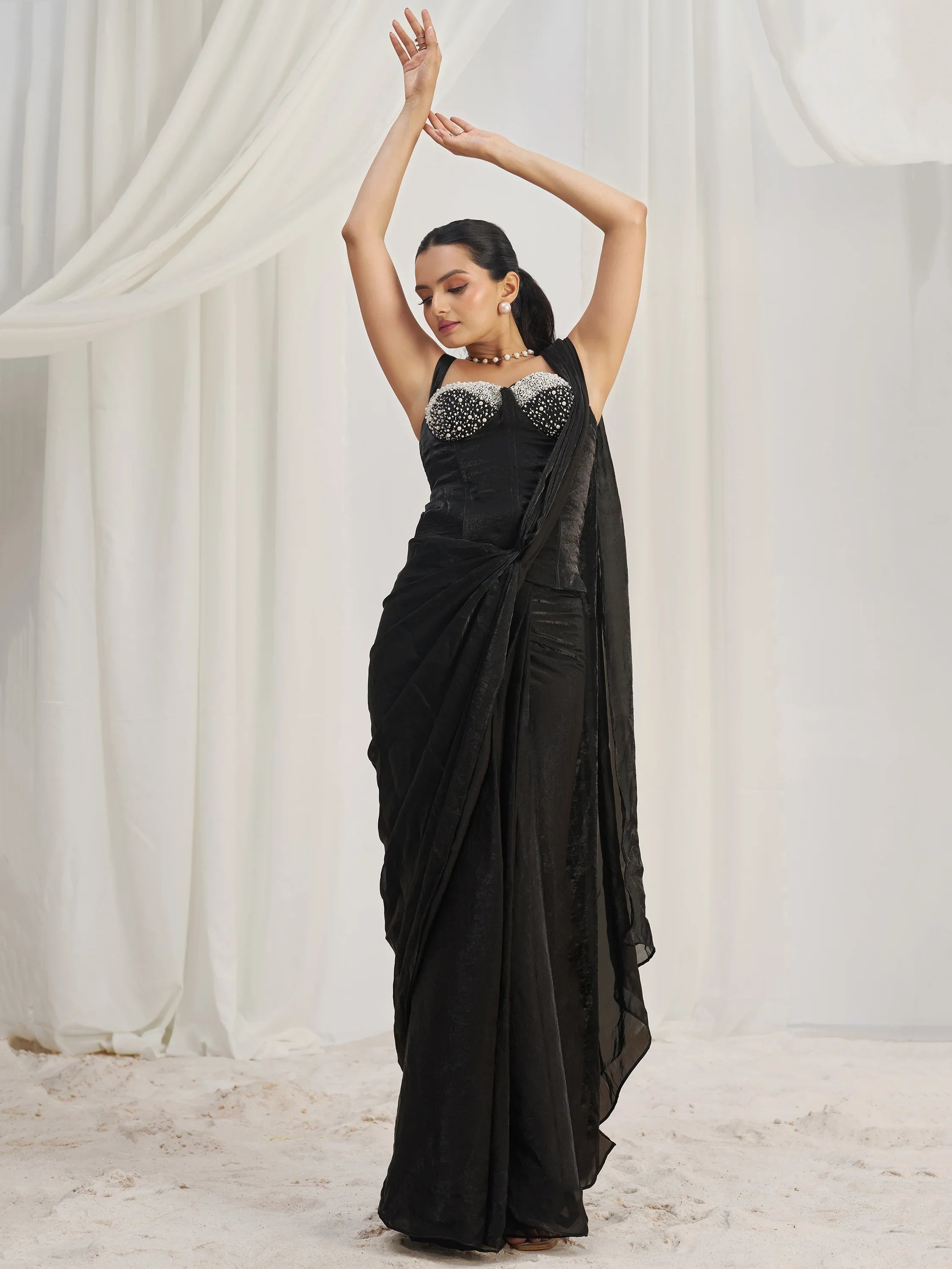 Fascinating Black Organza Party Wear Saree With Corset Blouse