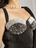Fascinating Black Organza Party Wear Saree With Corset Blouse