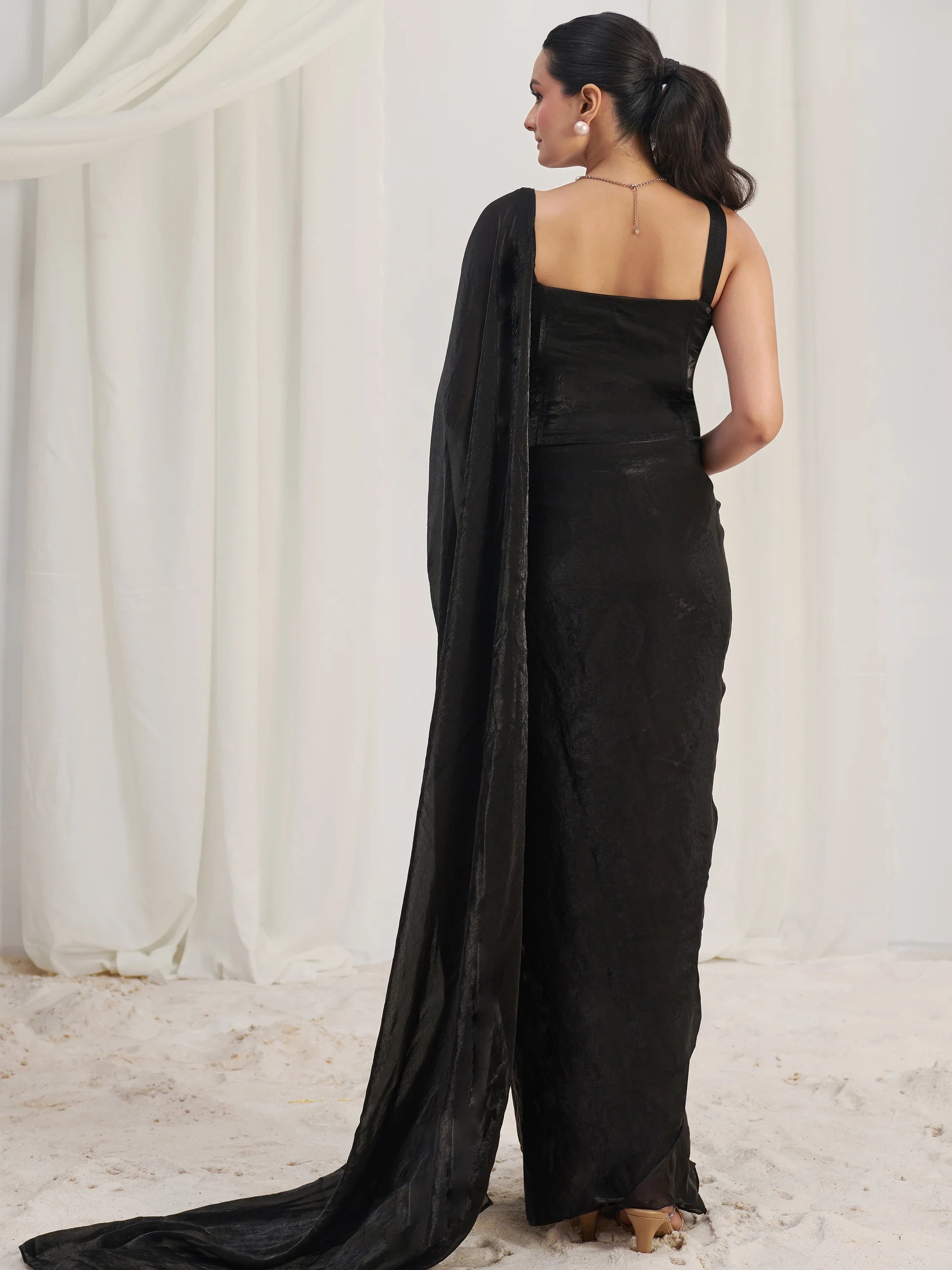 Fascinating Black Organza Party Wear Saree With Corset Blouse