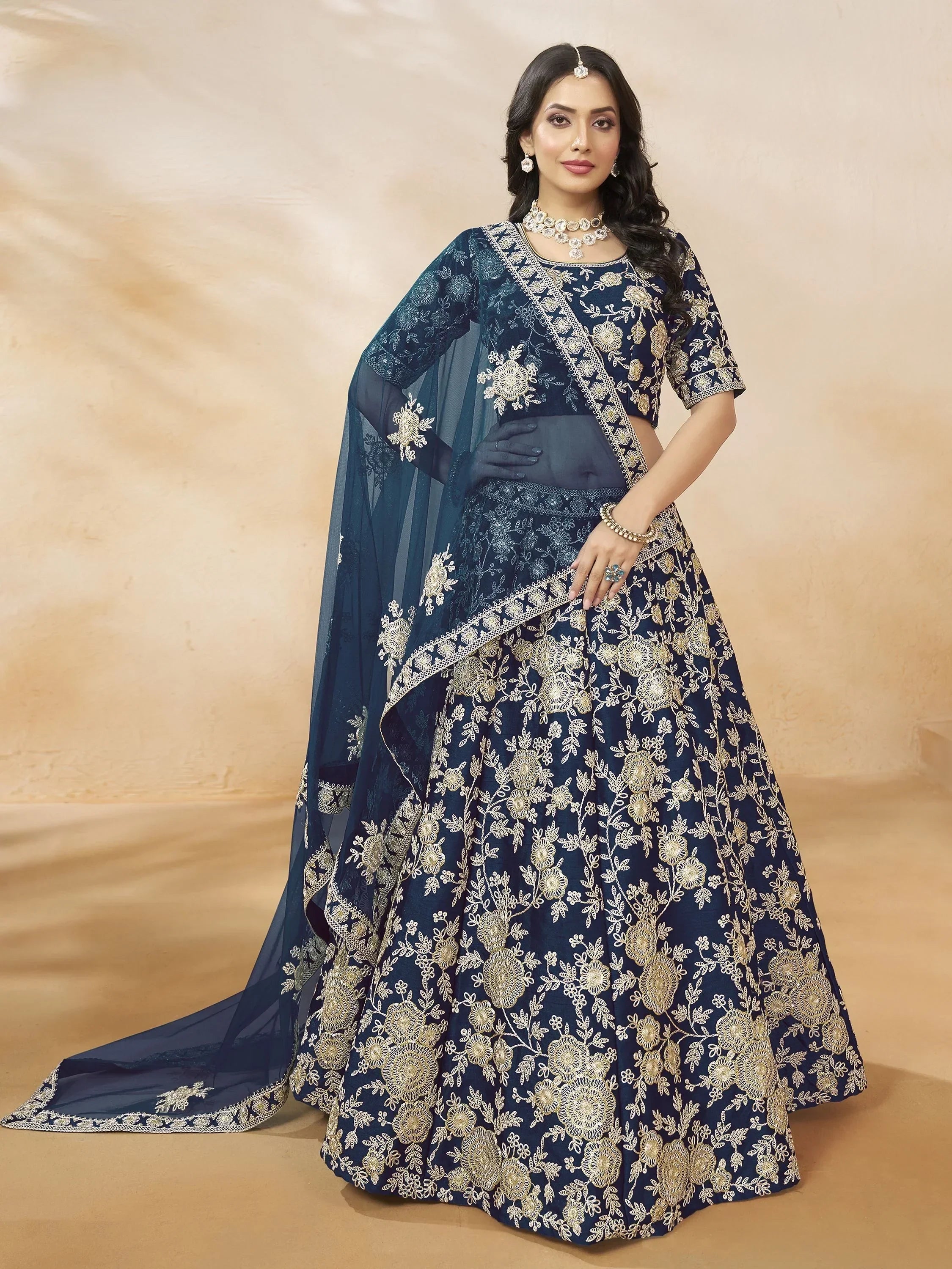 Navy blue designer lehenga choli with gold floral embroidery and sheer dupatta, Indian ethnic wear
