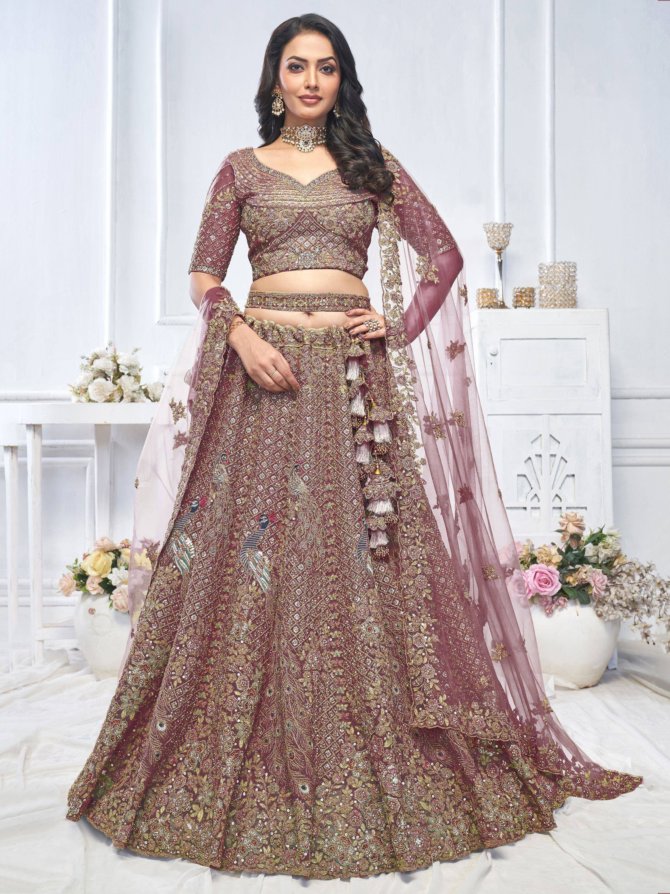Elegant maroon lehenga choli with peacock embroidery, perfect for Indian weddings and festive occasions.