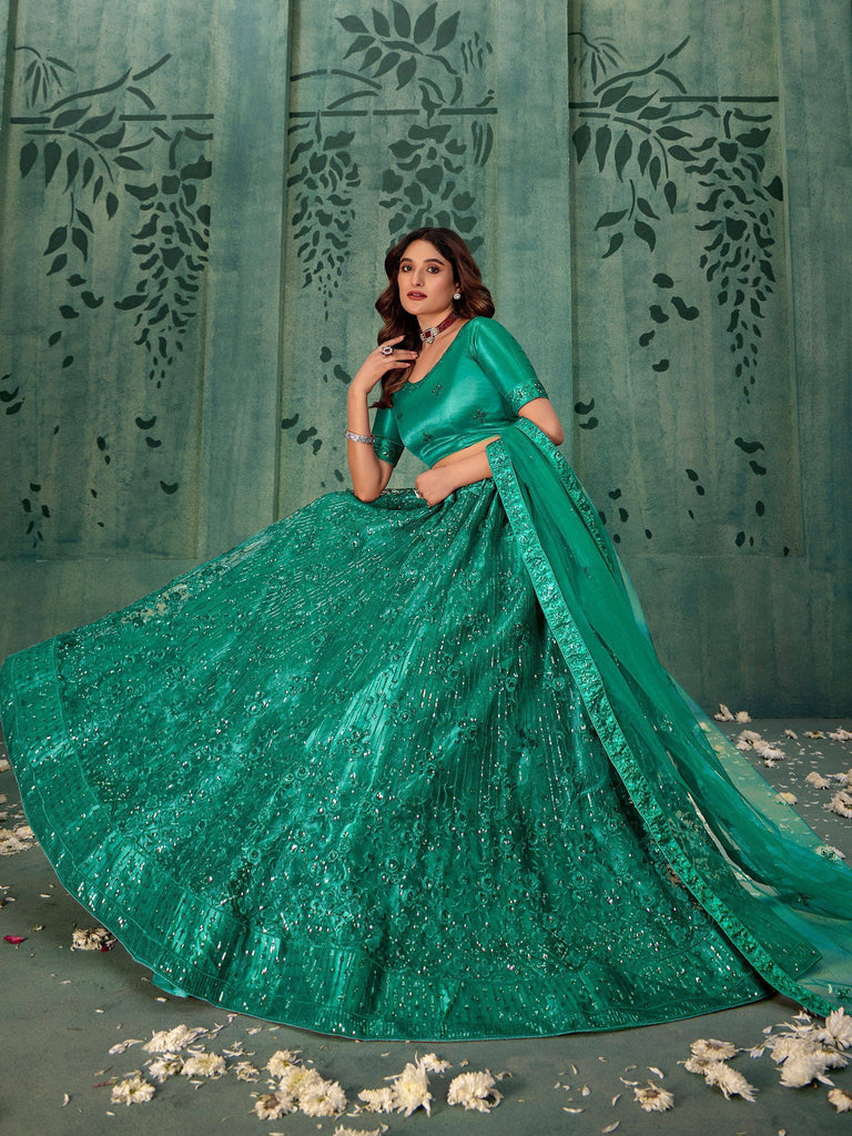 Emerald green designer lehenga choli with sequin work, perfect for Indian weddings and festive occasions
