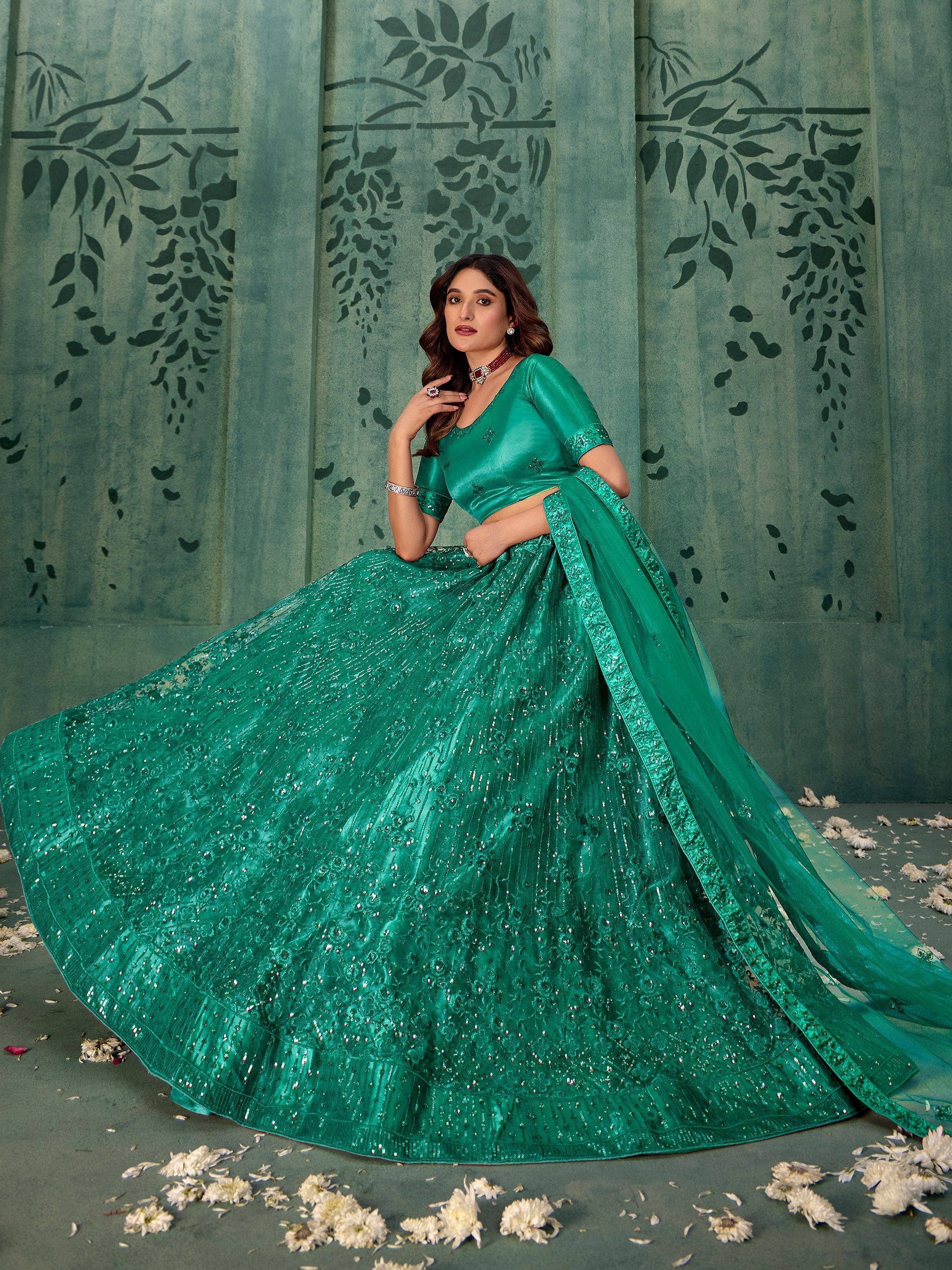 Emerald green designer lehenga choli with sequin work, perfect for Indian weddings and festive occasions