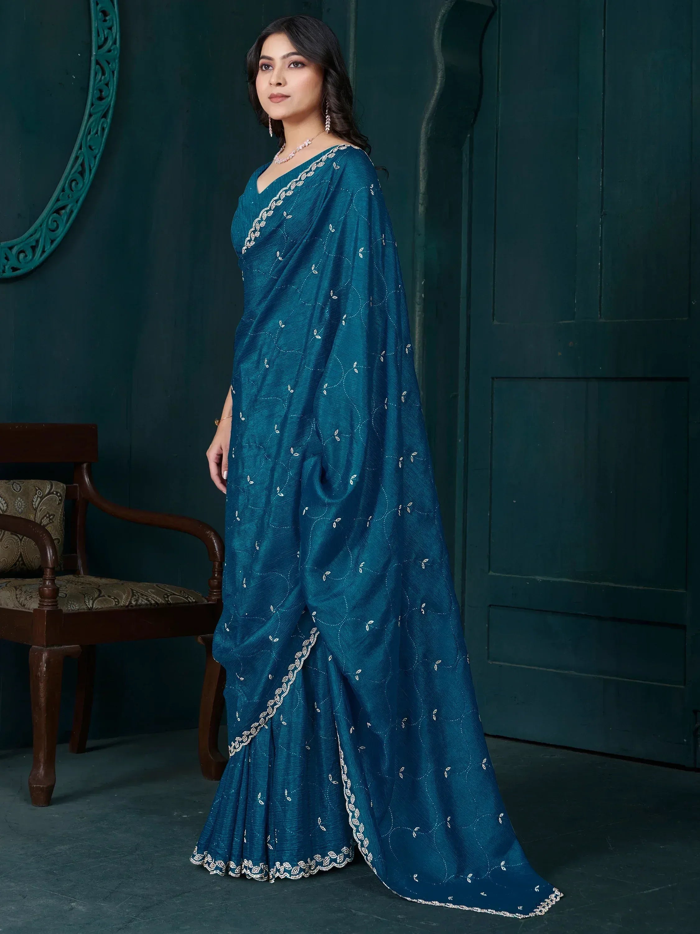 Teal blue embroidered saree with white threadwork, elegant Indian ethnic wear for women