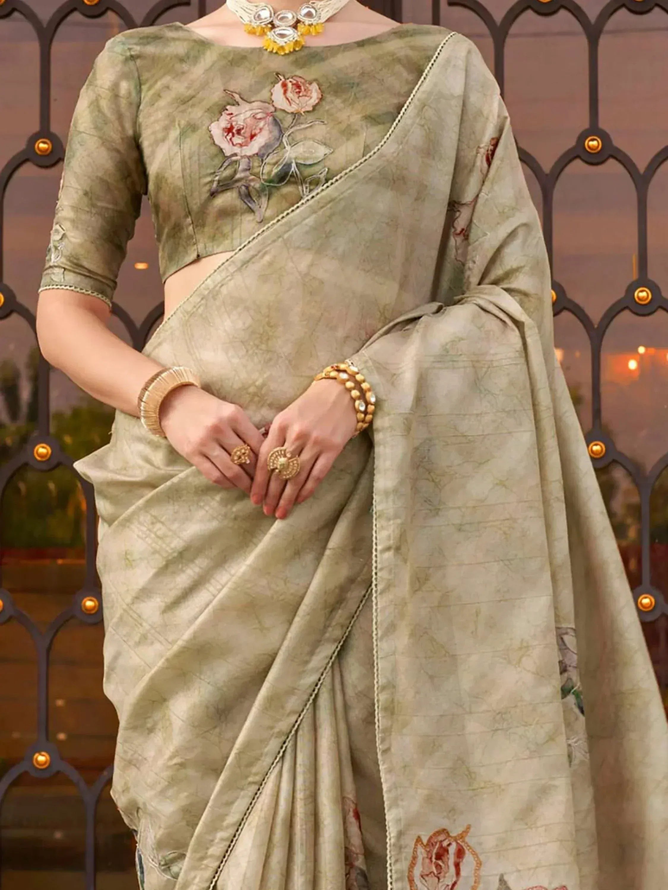 Olive green embroidered saree with floral blouse, perfect for Indian ethnic wear occasions.