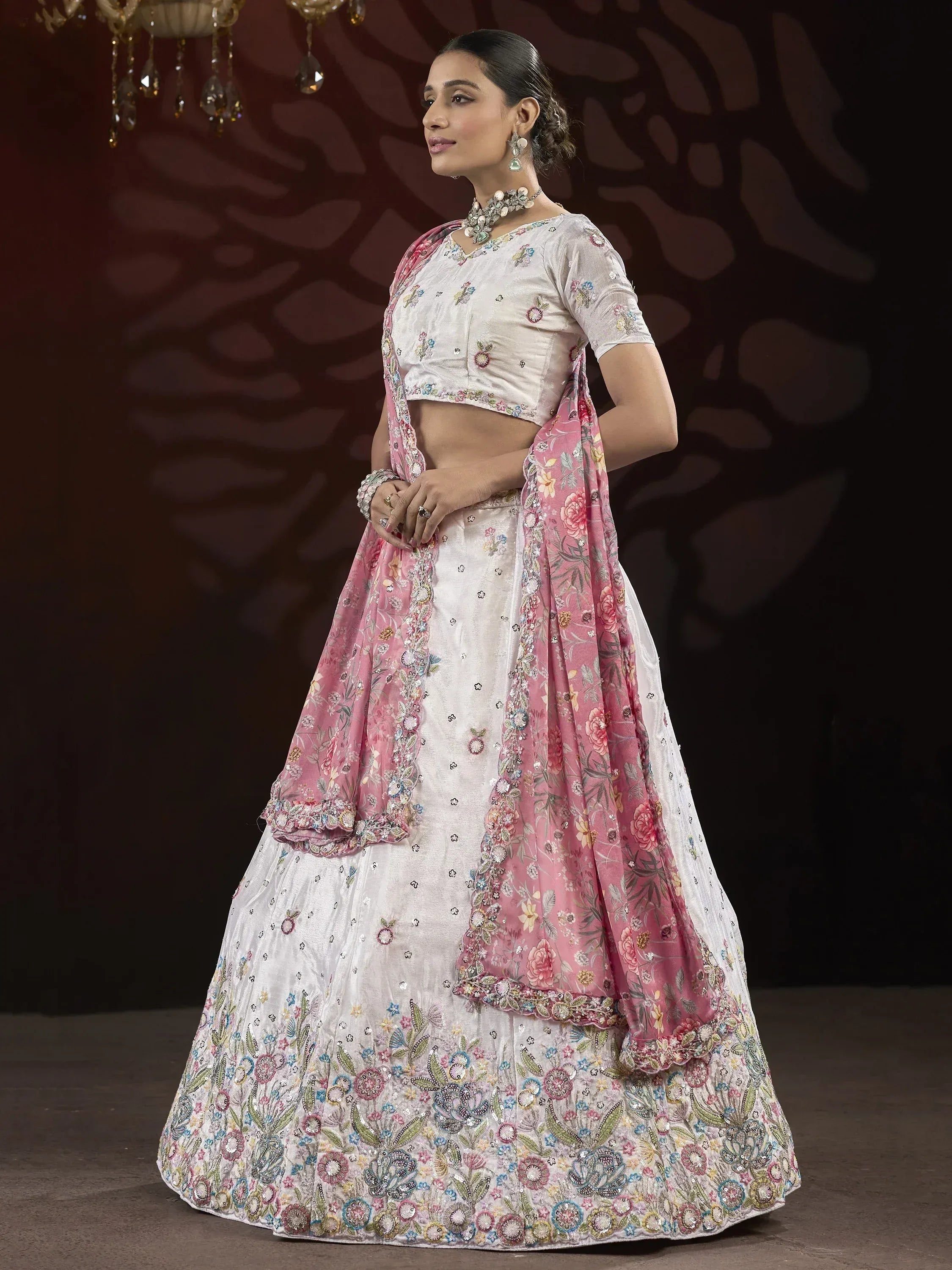White floral embroidered lehenga choli with pink dupatta, Indian ethnic wear for weddings and festivals