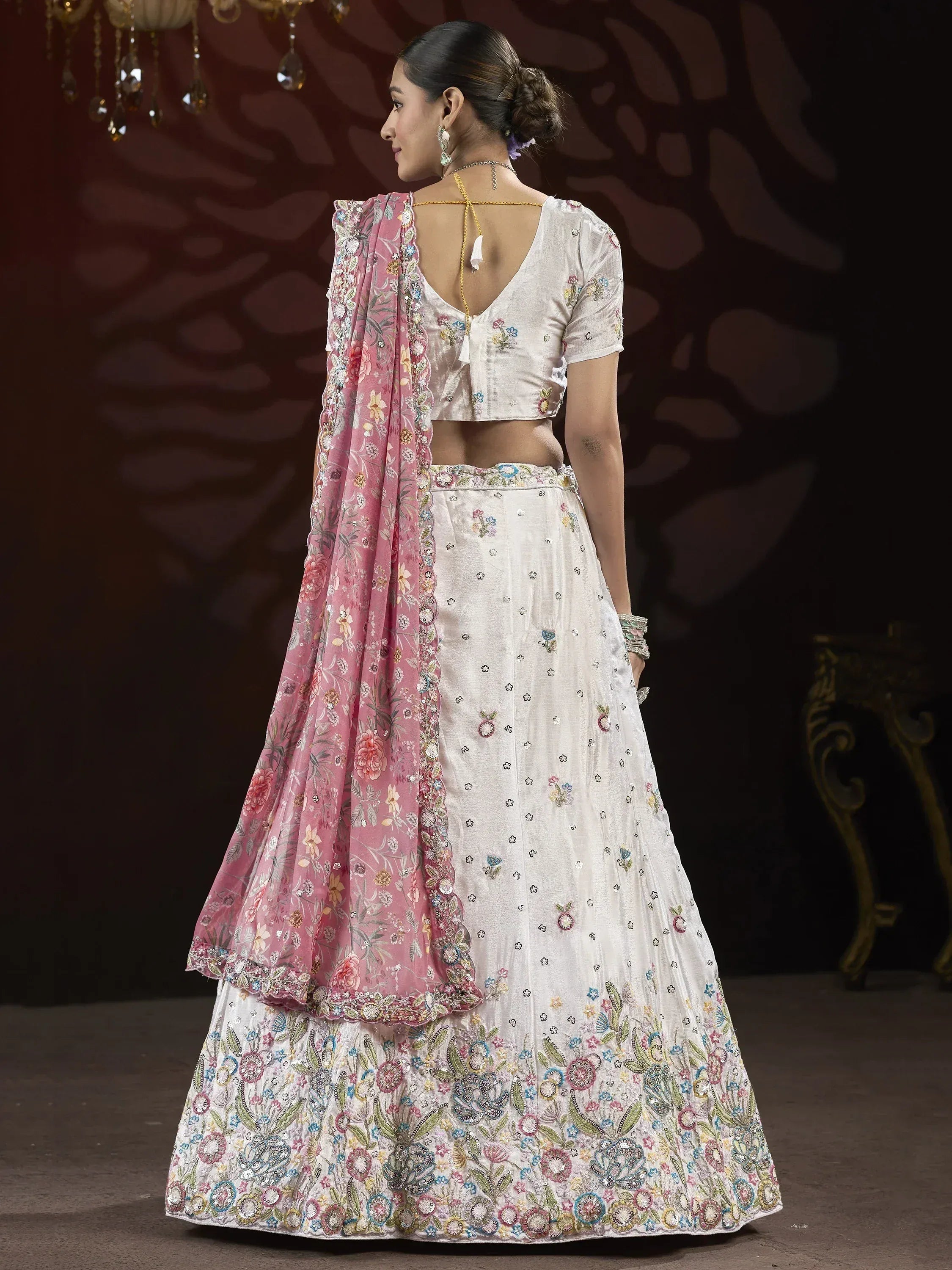 White floral embroidered lehenga choli with pink dupatta, ethnic Indian wear for weddings and parties