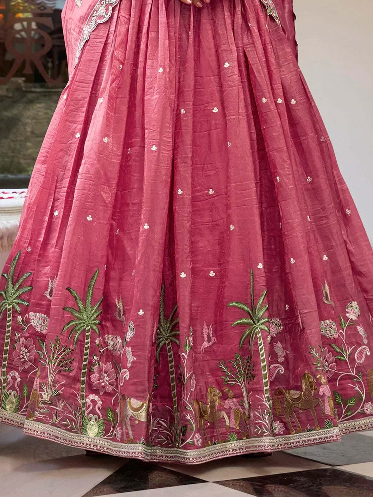 Pink embroidered lehenga with palm trees, horses, and floral motifs for Indian ethnic wear